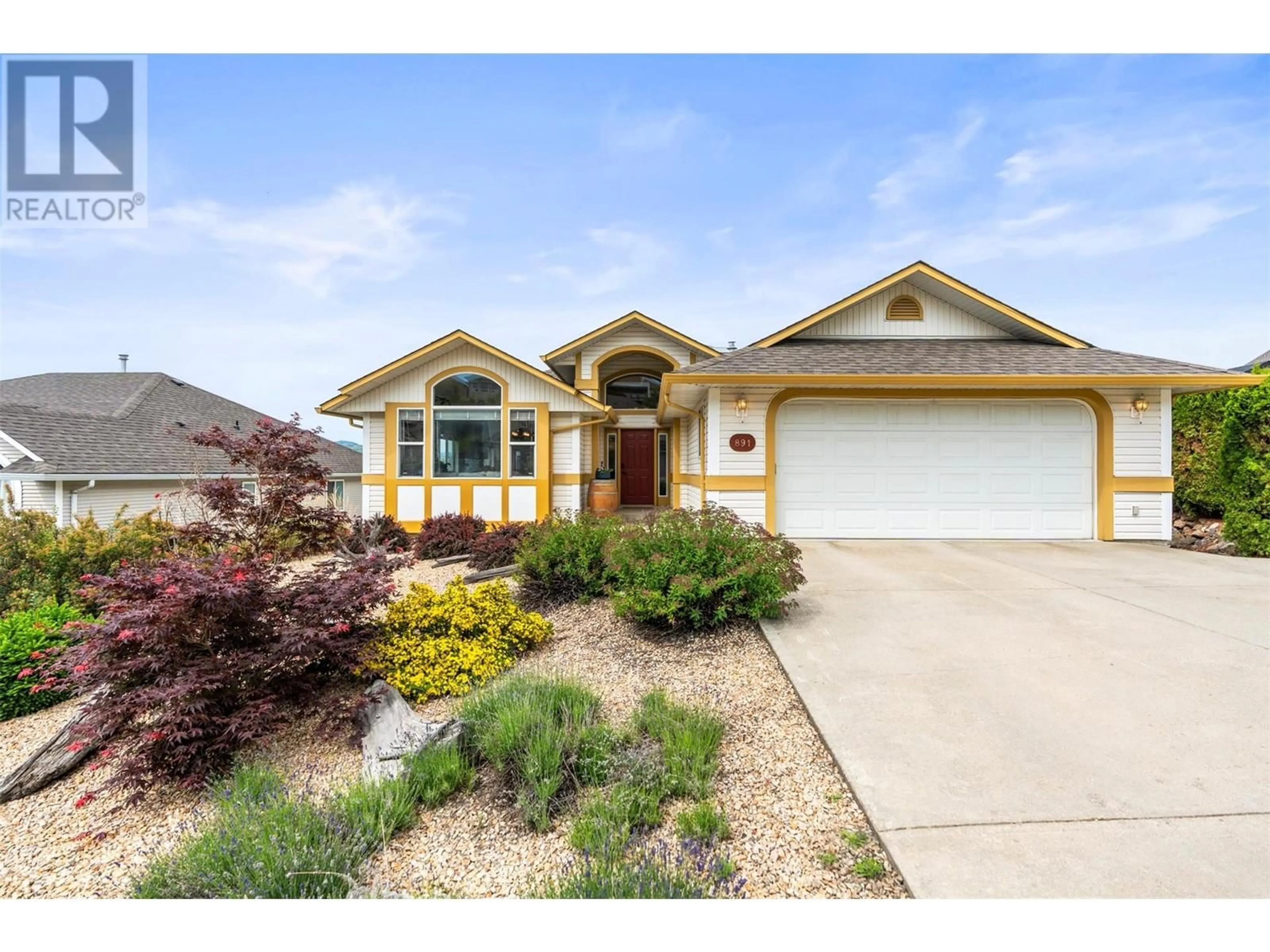 Home with vinyl exterior material, street for 891 MT. BULMAN PLACE, Vernon British Columbia V1B2Z4