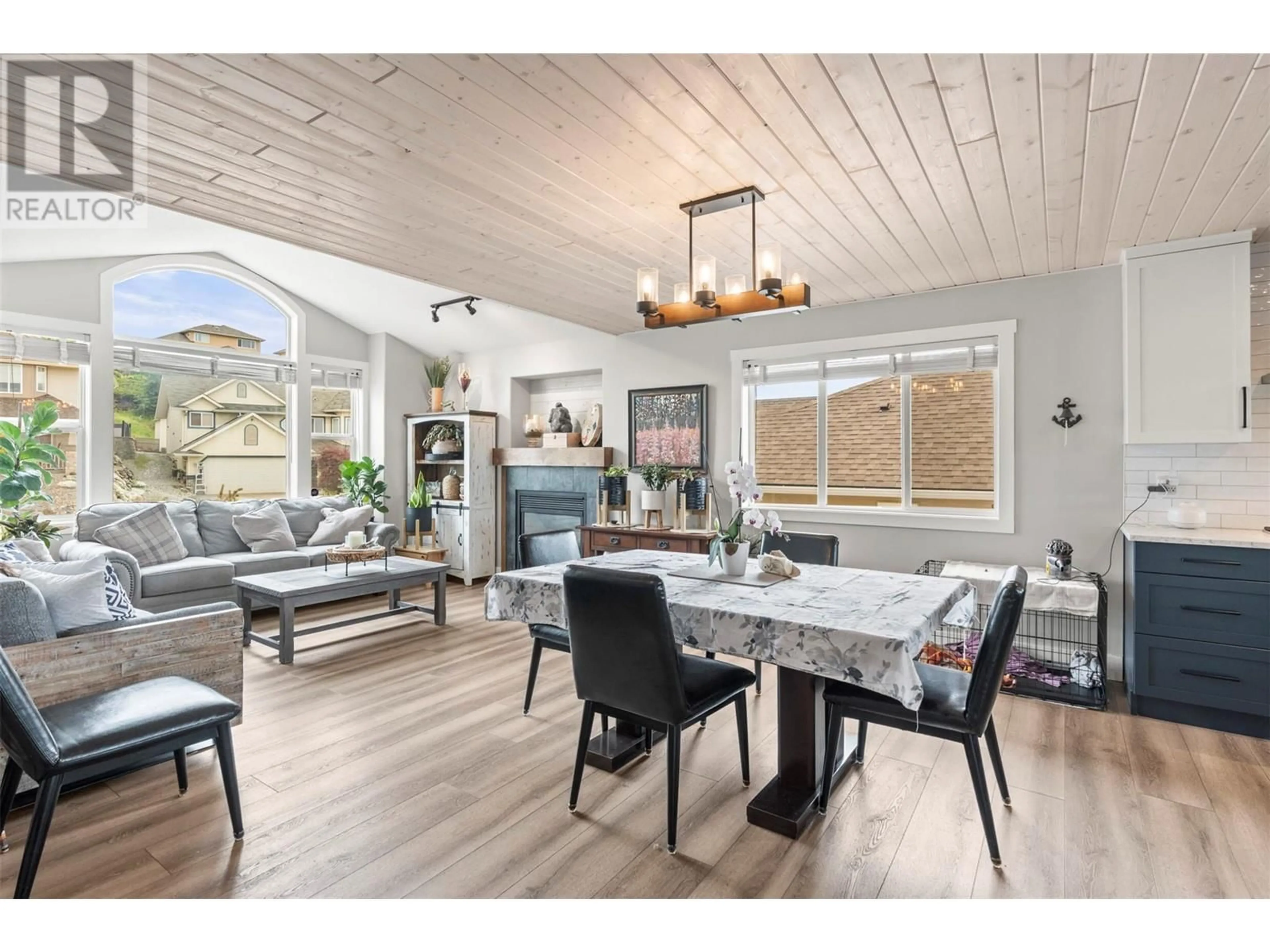 Open concept kitchen, wood/laminate floor for 891 MT. BULMAN PLACE, Vernon British Columbia V1B2Z4