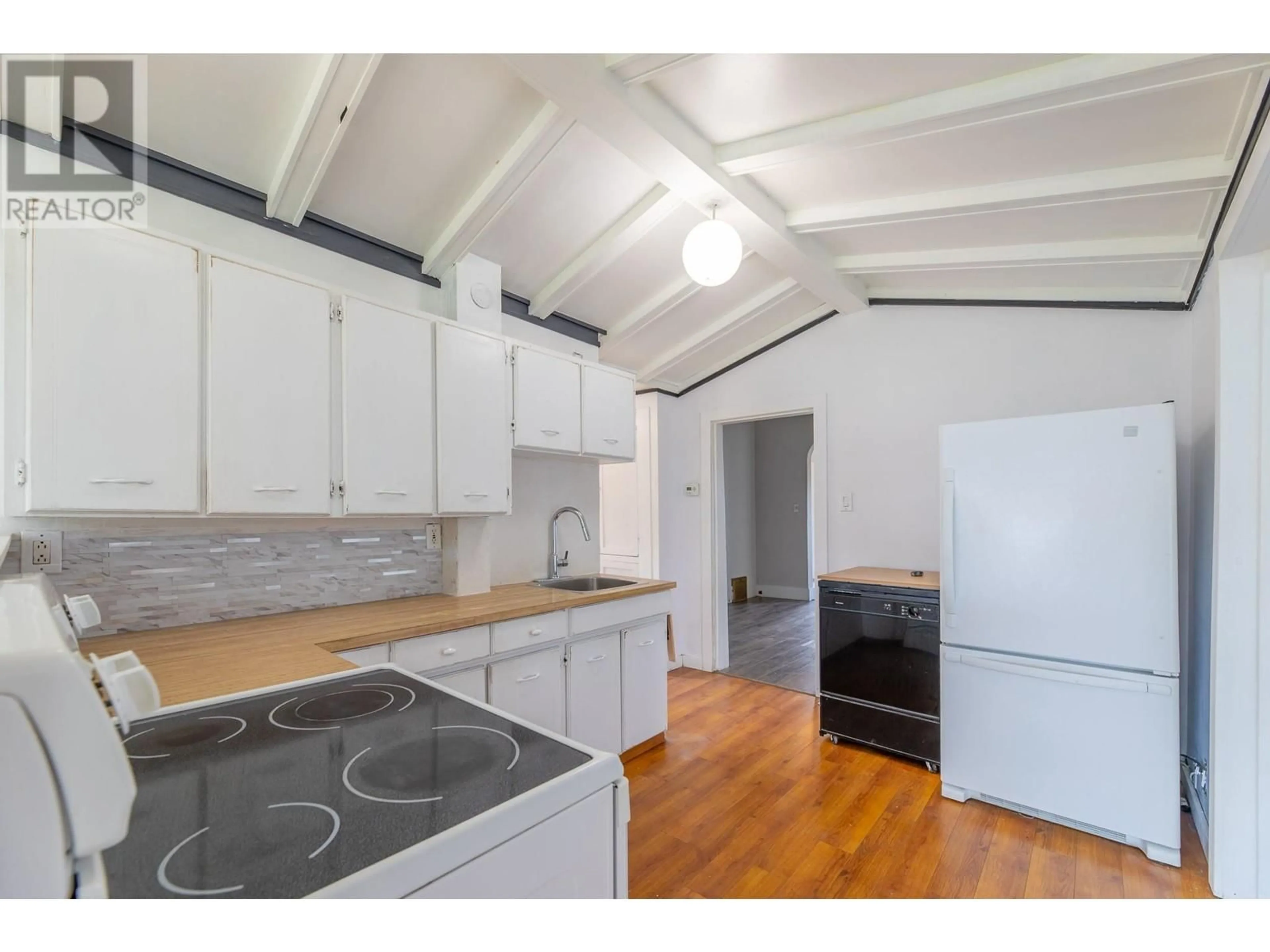 Standard kitchen, wood/laminate floor for 566 PENTICTON AVENUE, Penticton British Columbia V2A2M6