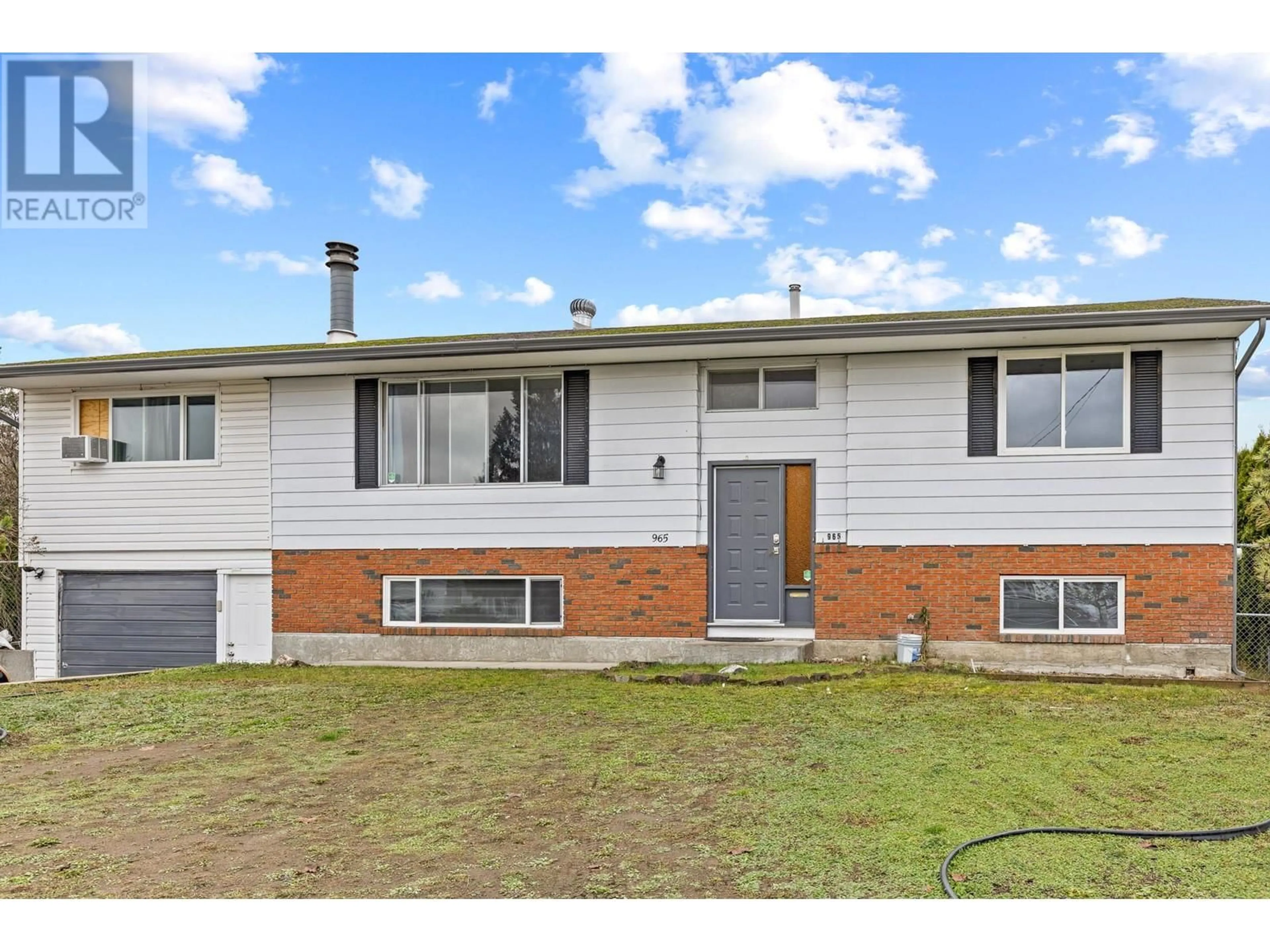 Home with brick exterior material, street for 965 GRAHAM RD ROAD, Kelowna British Columbia V1X5X4