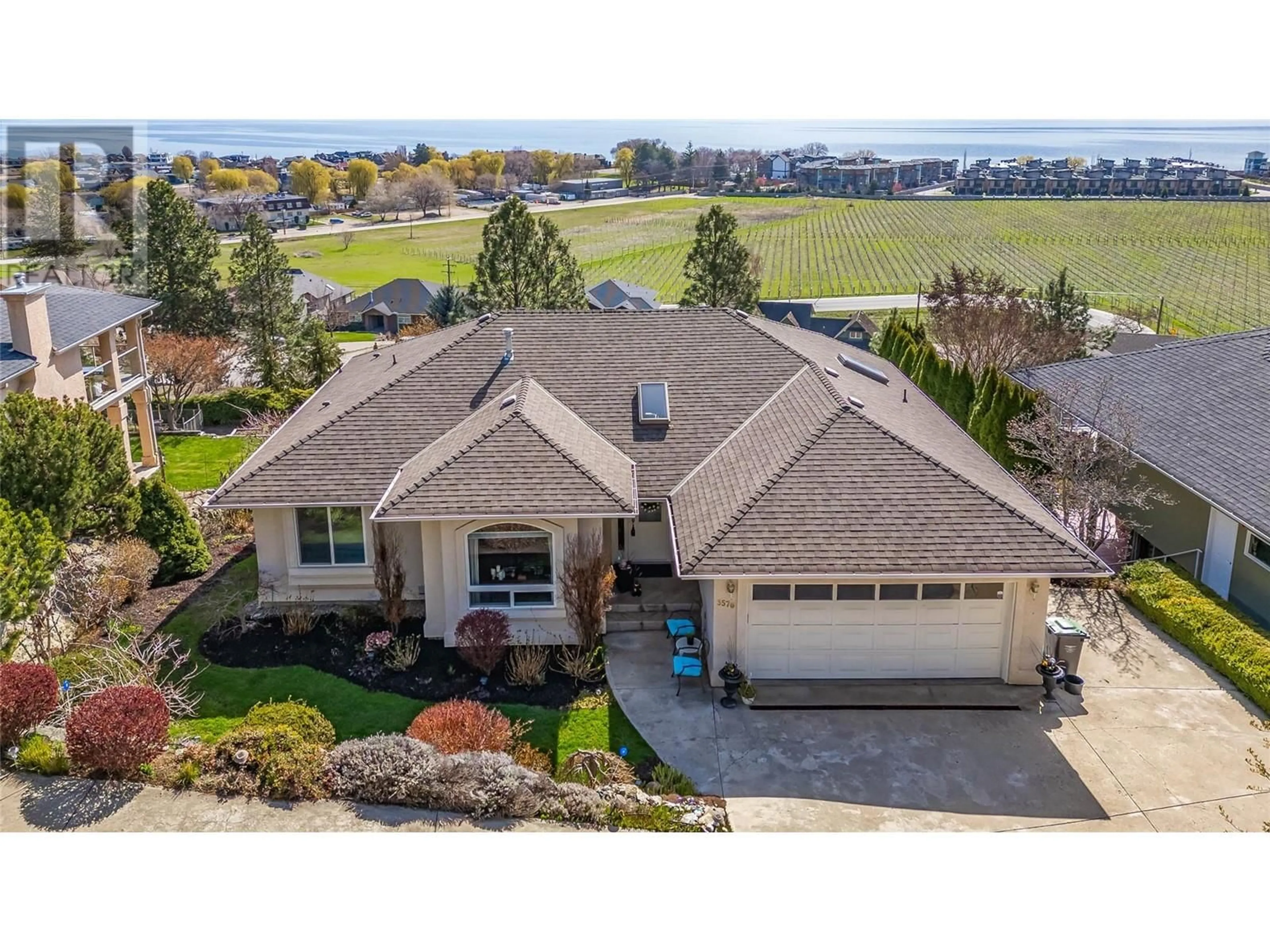 A pic from outside/outdoor area/front of a property/back of a property/a pic from drone, water/lake/river/ocean view for 3576 APPLE WAY BOULEVARD, West Kelowna British Columbia V4T1Y7