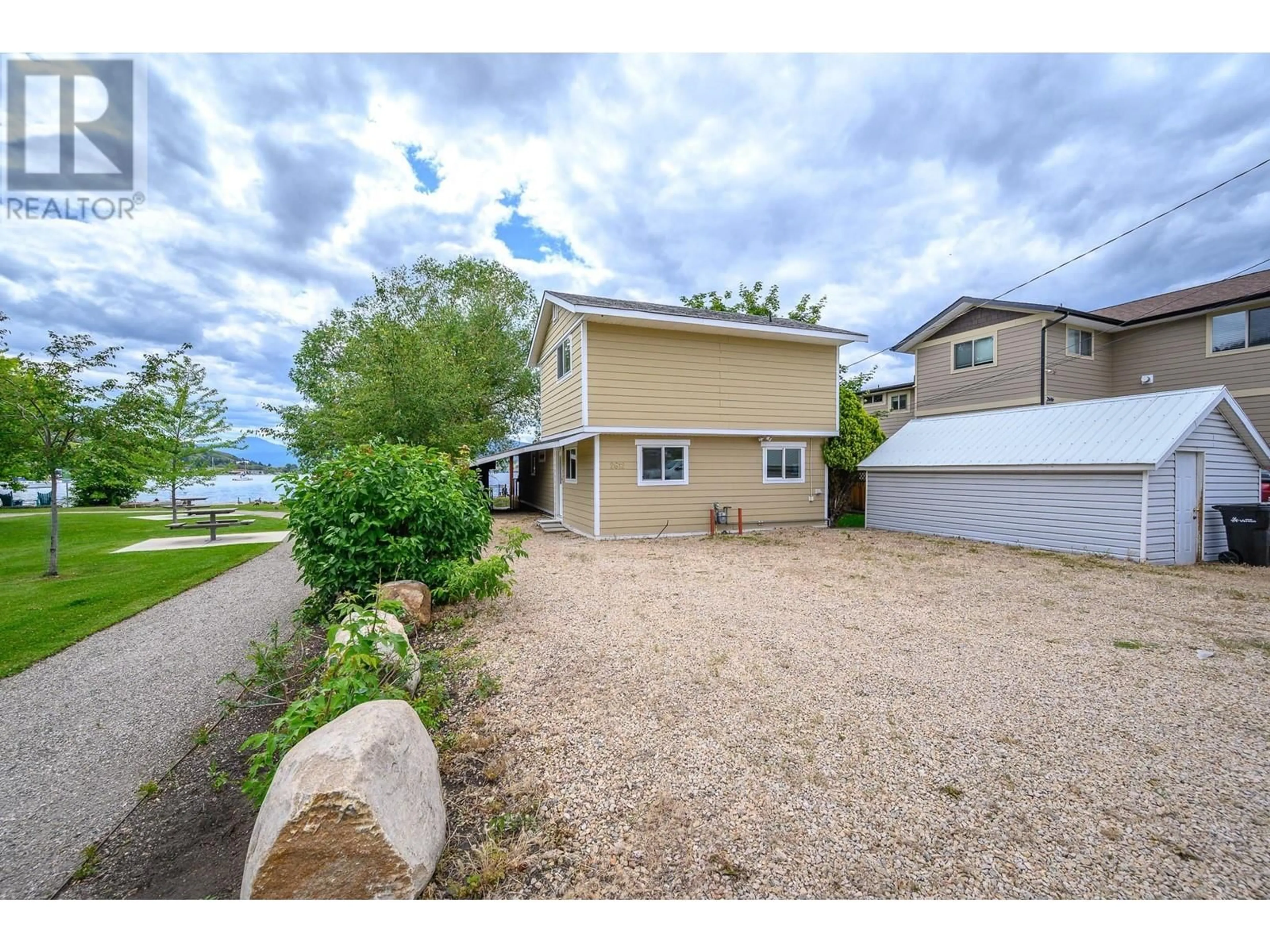 A pic from outside/outdoor area/front of a property/back of a property/a pic from drone, water/lake/river/ocean view for 2612 LAKESHORE ROAD, Vernon British Columbia V1H1N1