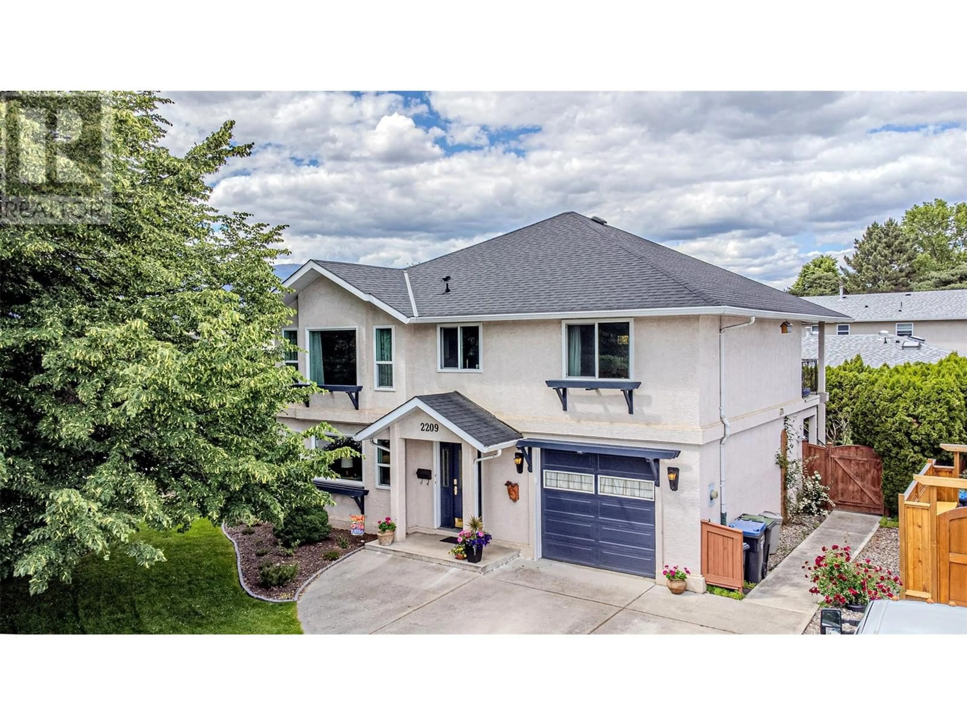 A pic from outside/outdoor area/front of a property/back of a property/a pic from drone, street for 2209 STILLINGFLEET COURT, Kelowna British Columbia V1Y9N3