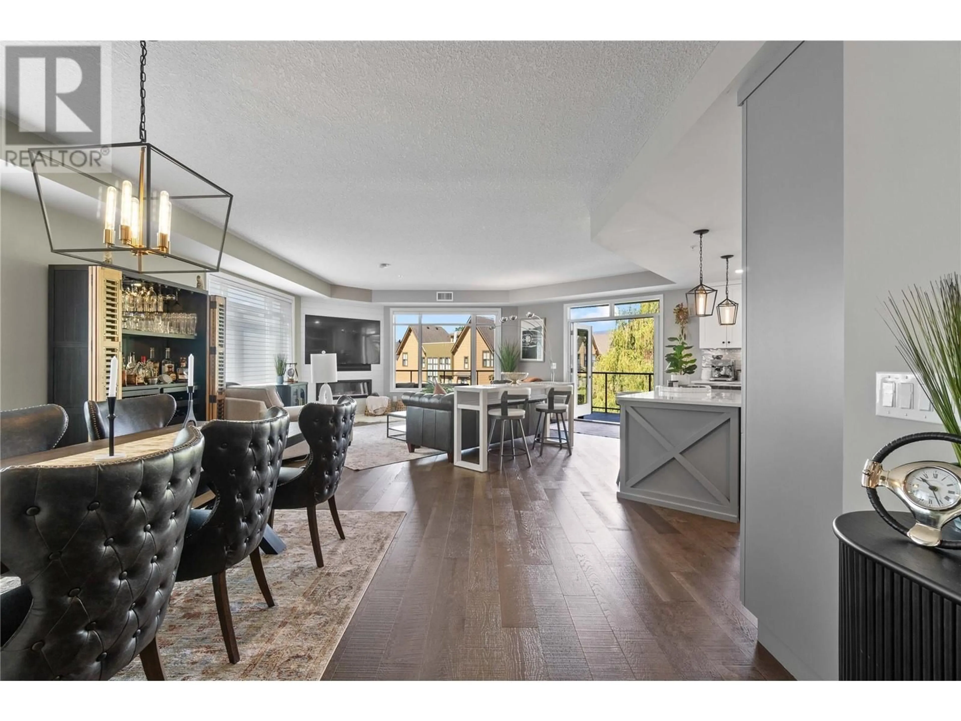 Open concept kitchen, wood/laminate floor for 301 - 529 TRUSWELL ROAD, Kelowna British Columbia V1W3K7