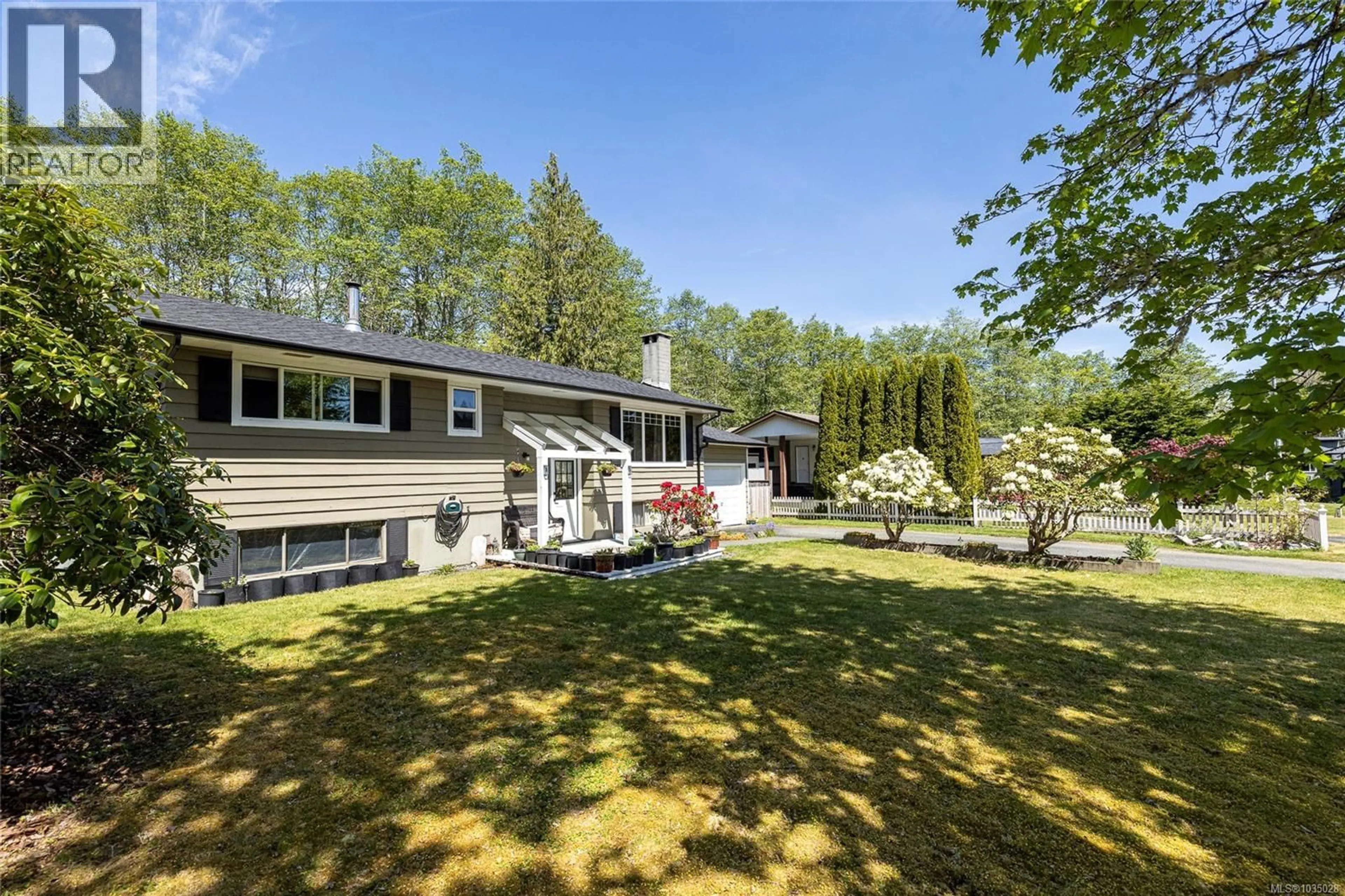 A pic from outside/outdoor area/front of a property/back of a property/a pic from drone, forest/trees view for 7435 THUNDERBIRD WAY, Port Hardy British Columbia V0N2P0