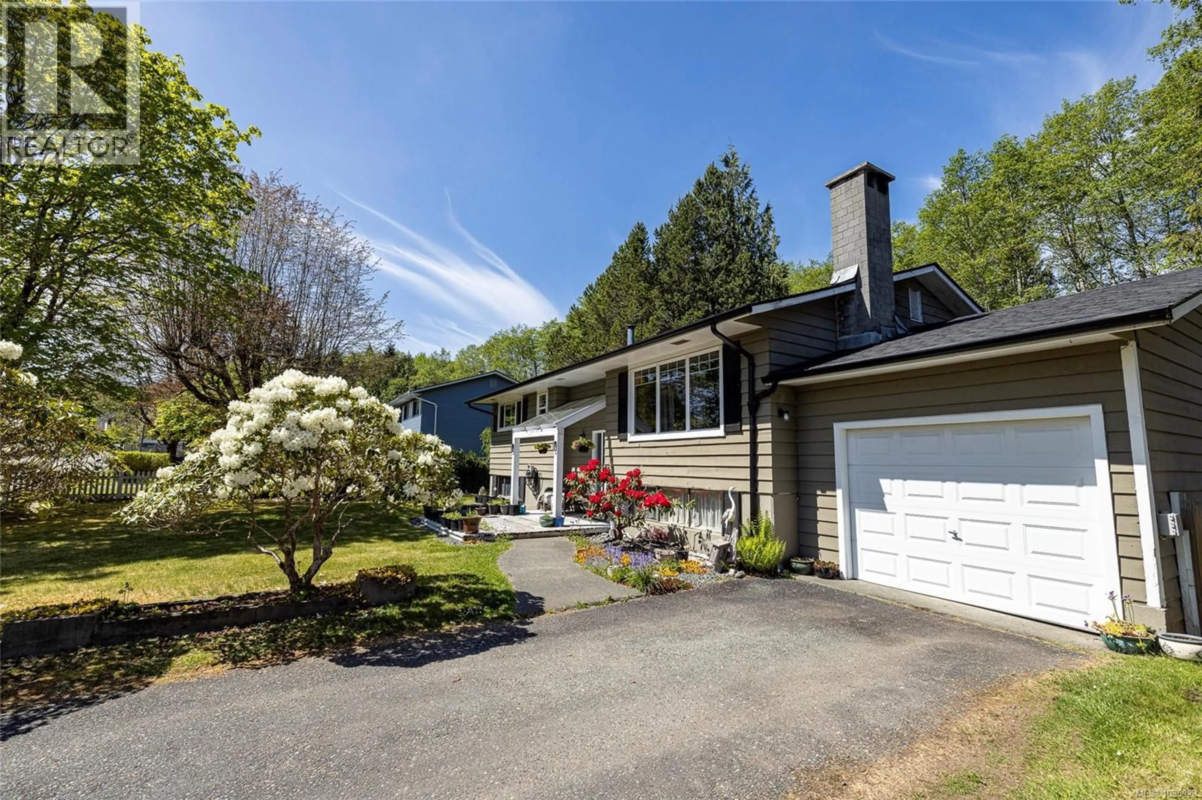 Home with vinyl exterior material, street for 7435 THUNDERBIRD WAY, Port Hardy British Columbia V0N2P0