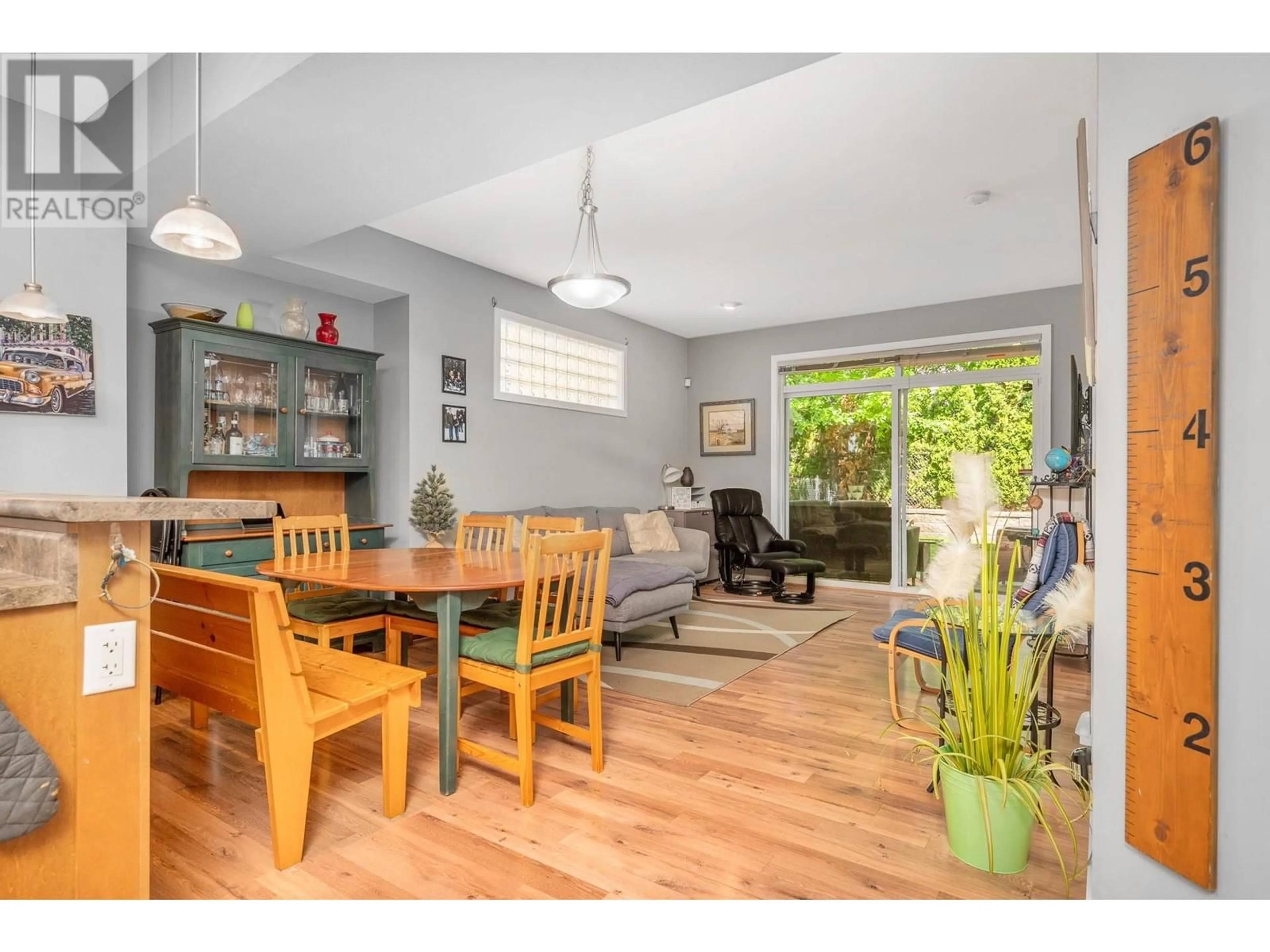 Open concept kitchen, wood/laminate floor for 24 - 100 PALMER ROAD, Vernon British Columbia V1H2H8