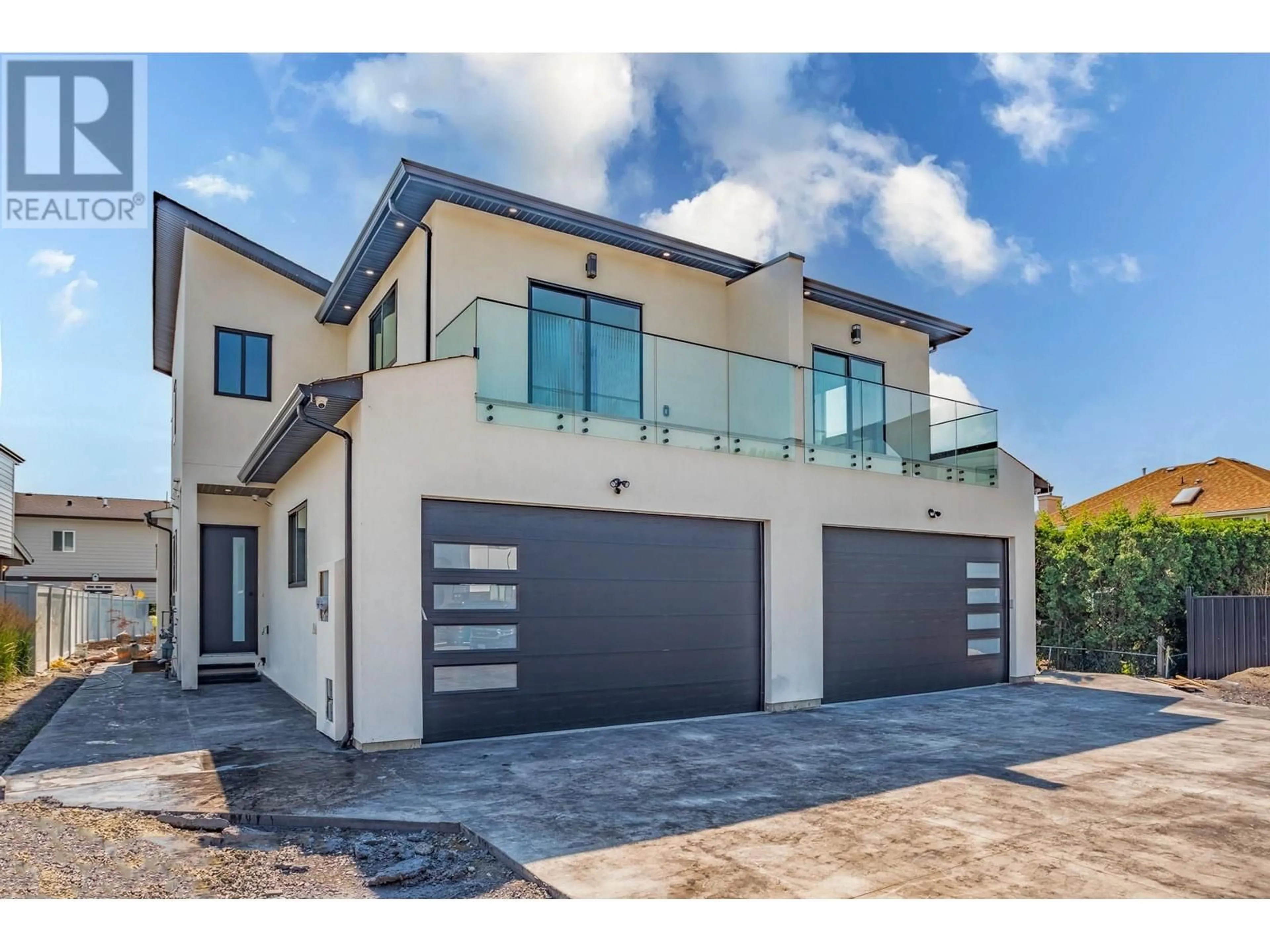 Home with brick exterior material, street for 1946 HEMMERLING COURT, Kelowna British Columbia V1V1X1