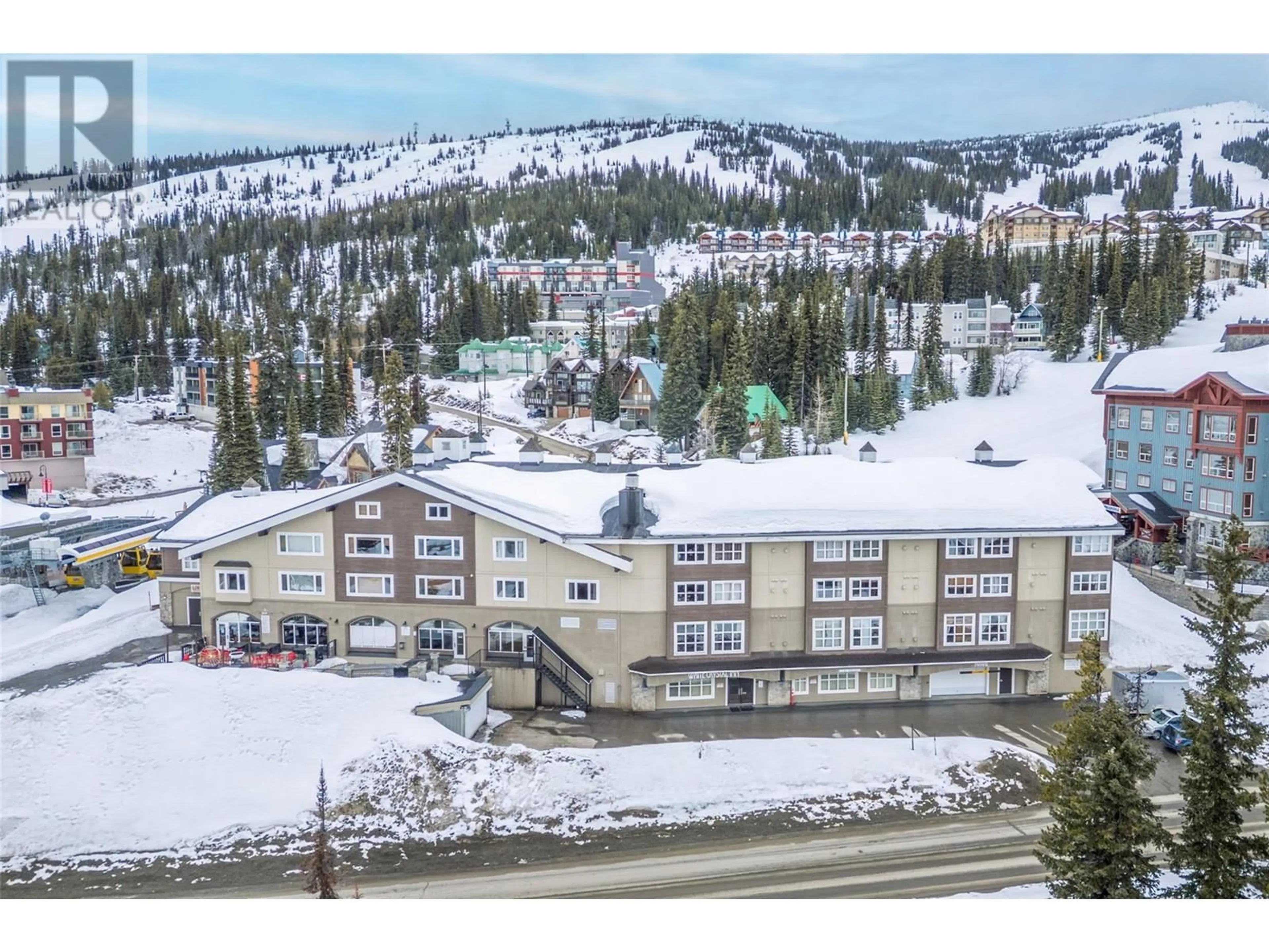 A pic from outside/outdoor area/front of a property/back of a property/a pic from drone, mountain view for 314 - 5275 BIG WHITE ROAD, Big White British Columbia V1P1P3