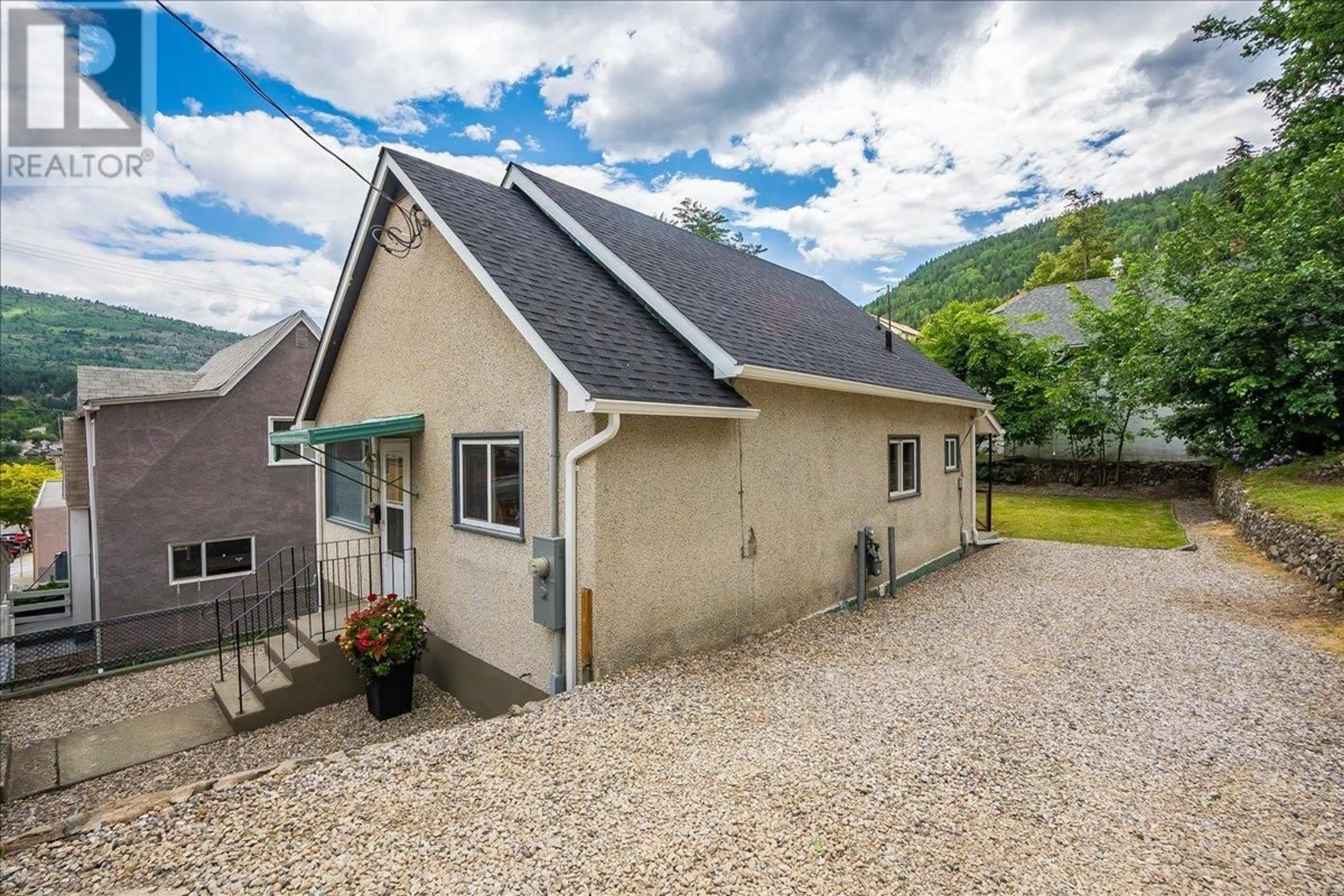 A pic from outside/outdoor area/front of a property/back of a property/a pic from drone, unknown for 710 SPOKANE STREET, Trail British Columbia V1R3W2