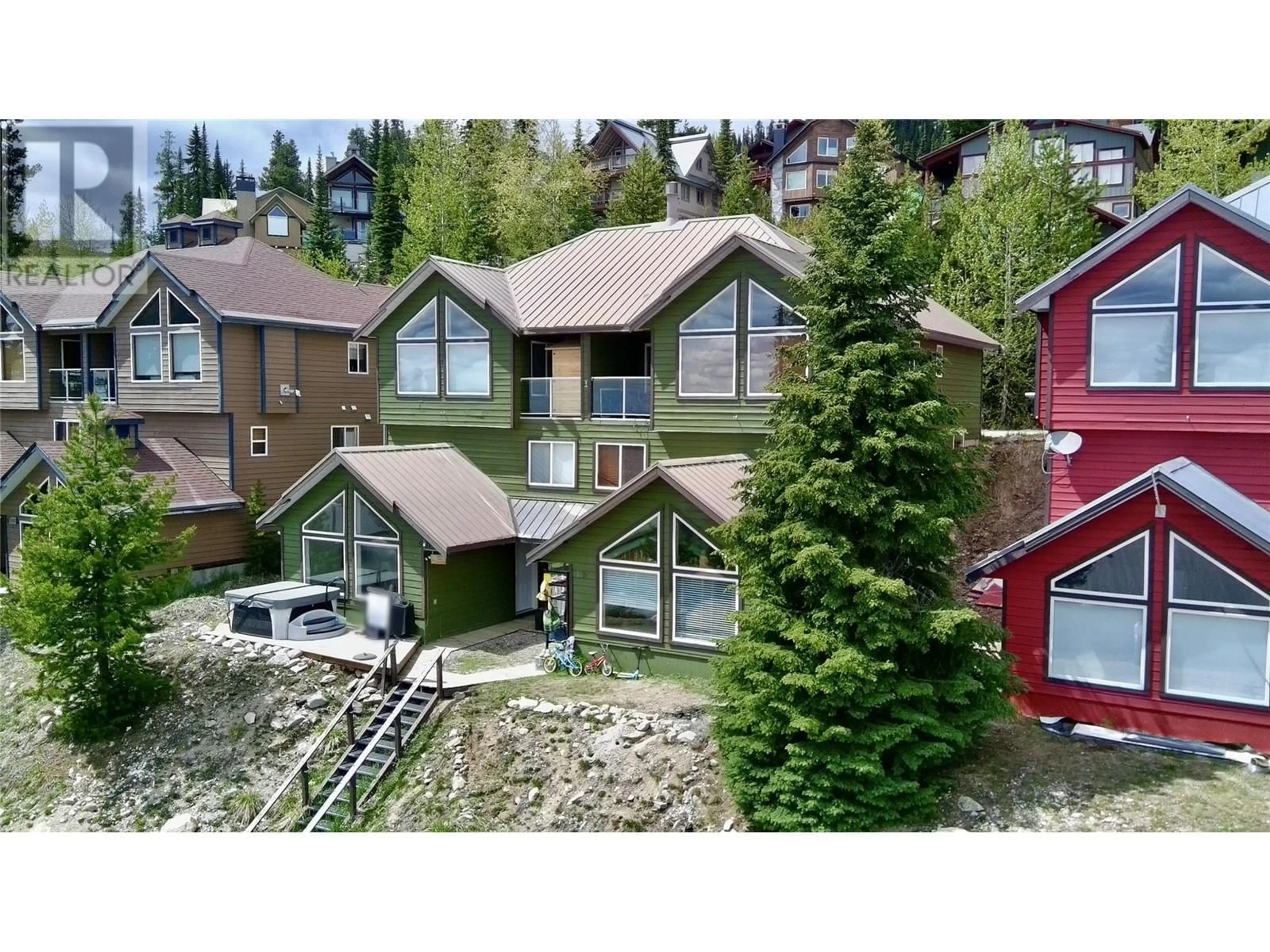 A pic from outside/outdoor area/front of a property/back of a property/a pic from drone, unknown for 117C - 5981 SNOW PINES CRESCENT, Big White British Columbia V1P1P3