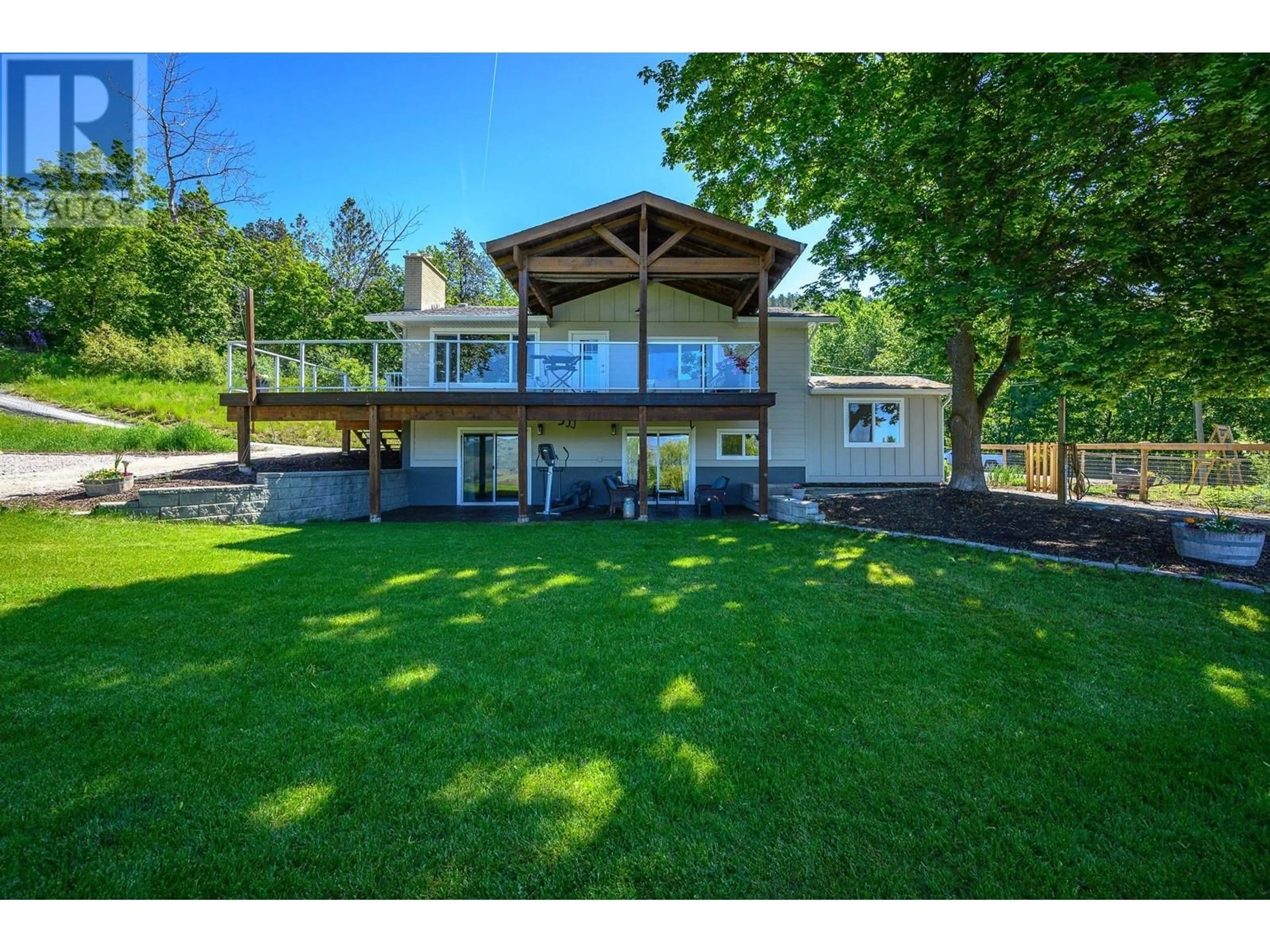 A pic from outside/outdoor area/front of a property/back of a property/a pic from drone, water/lake/river/ocean view for 3253 PHILLIPS ROAD, Vernon British Columbia V1B3H6