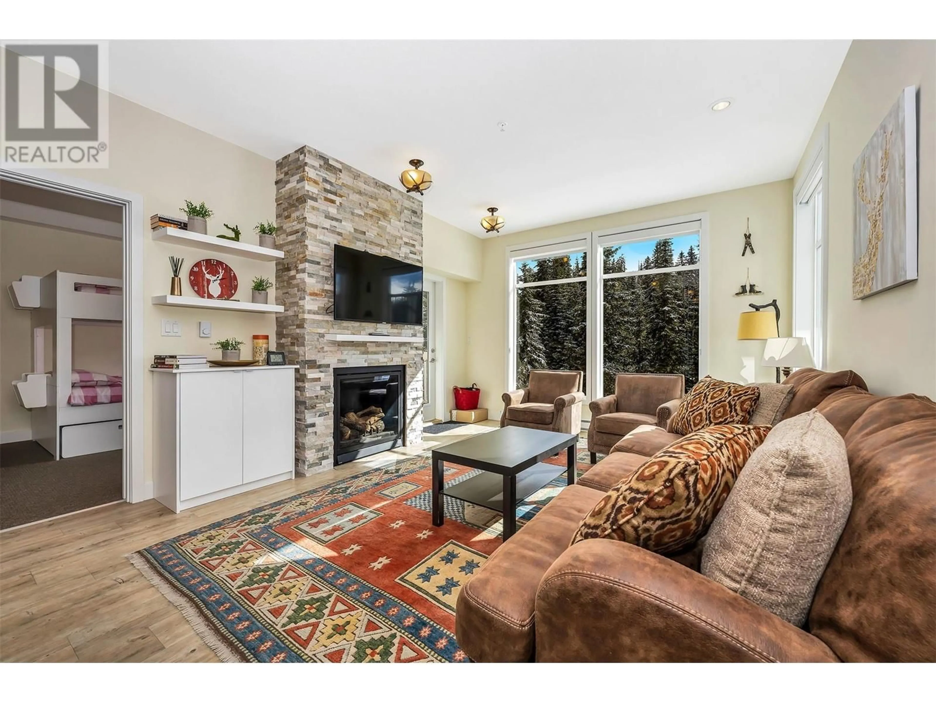 Living room with furniture, unknown for 212 - 30 MONASHEE ROAD, Silver Star British Columbia V1B3M1