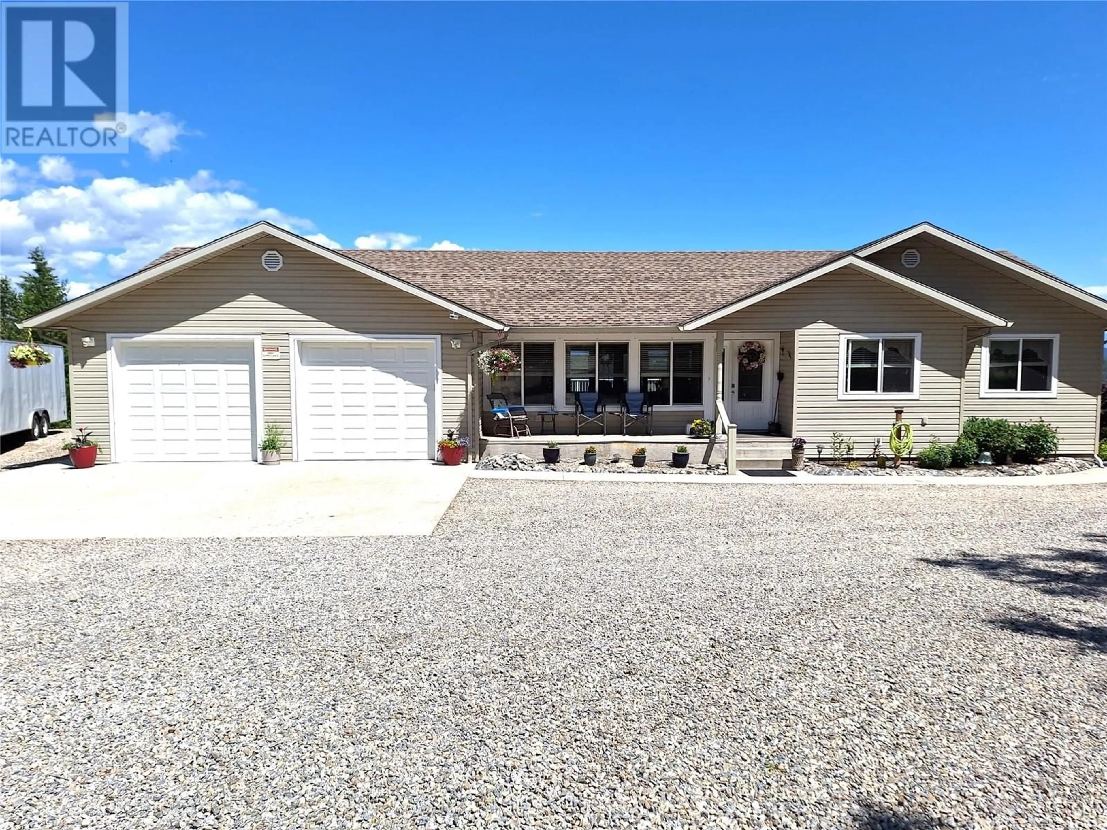 Home with vinyl exterior material, street for 1406 HUCKLEBERRY DRIVE, Sorrento British Columbia V0E2W1