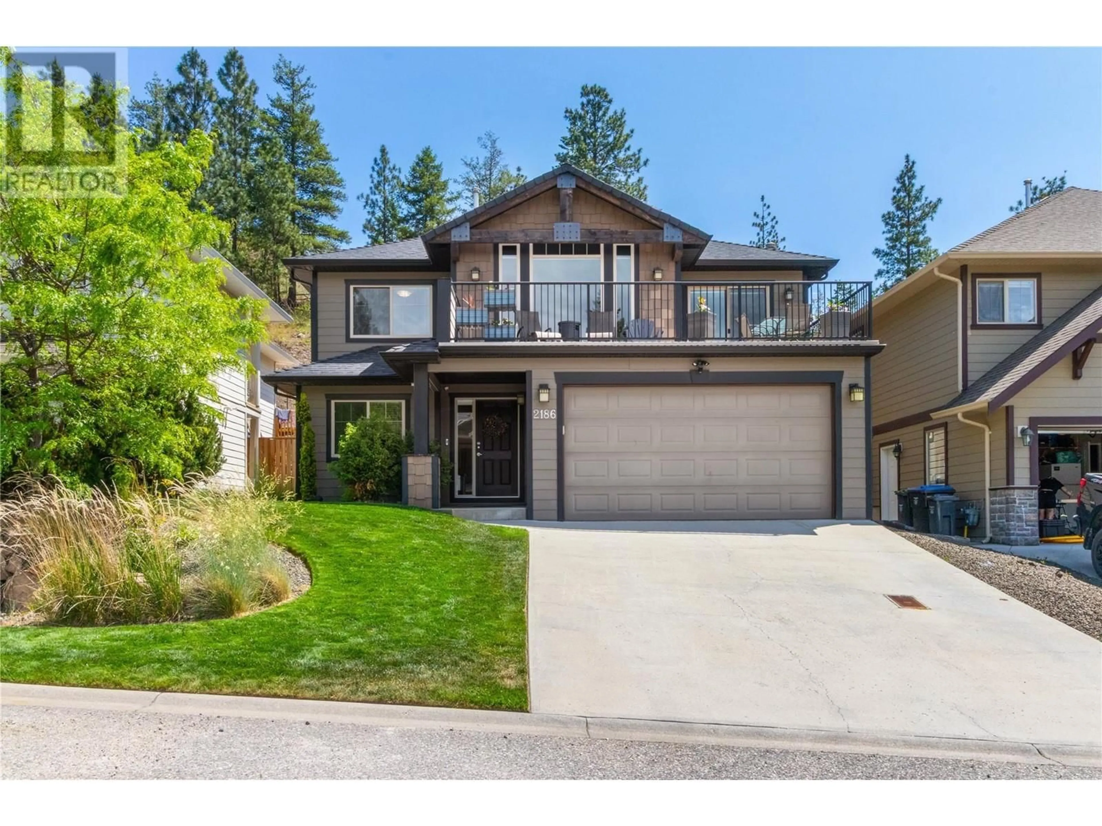 Home with vinyl exterior material, street for 2186 SUNVIEW DRIVE, West Kelowna British Columbia V1Z3X9