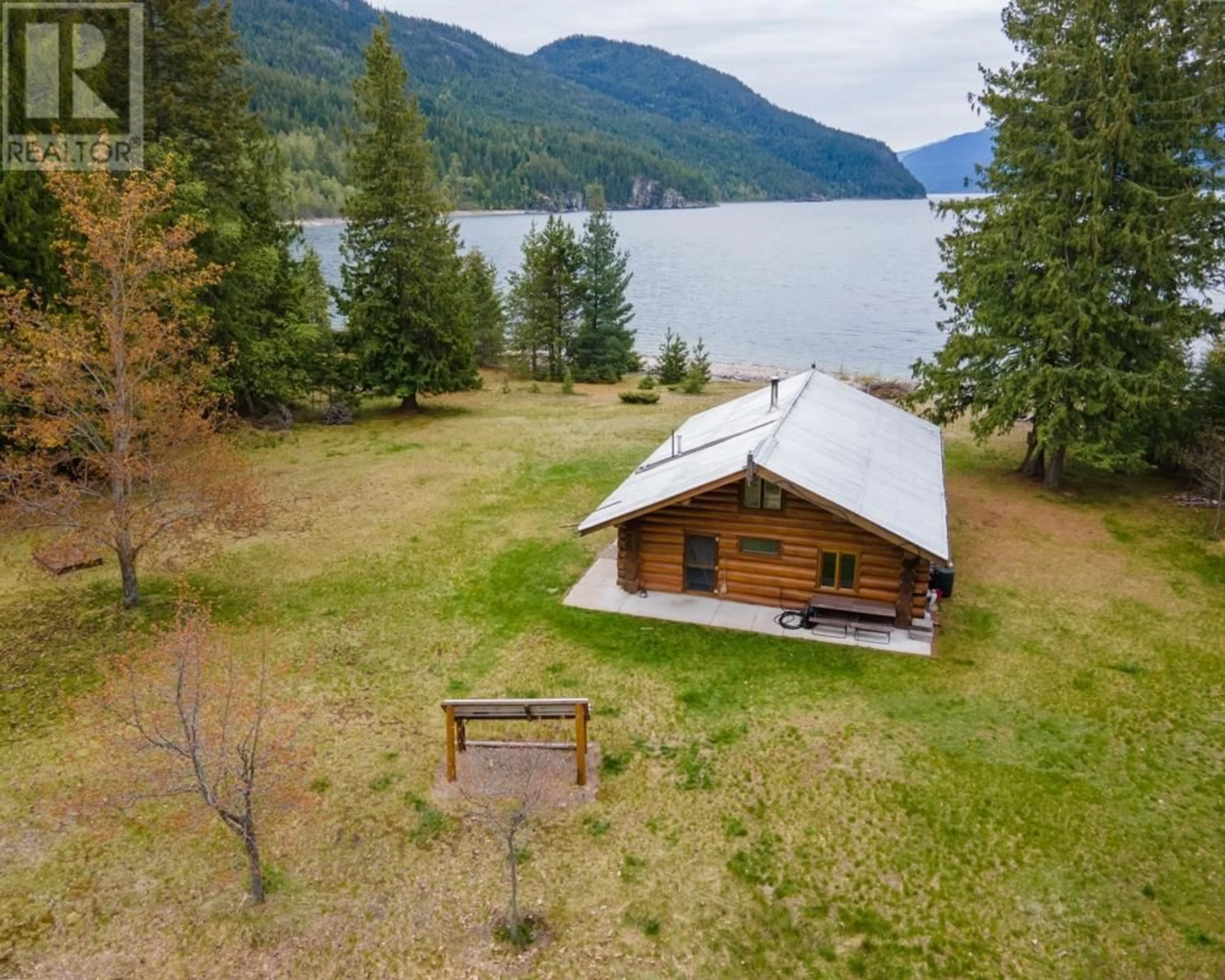 A pic from outside/outdoor area/front of a property/back of a property/a pic from drone, water/lake/river/ocean view for 7717 NORTH KOOTENAY LAKE, Kaslo British Columbia V0G1M0