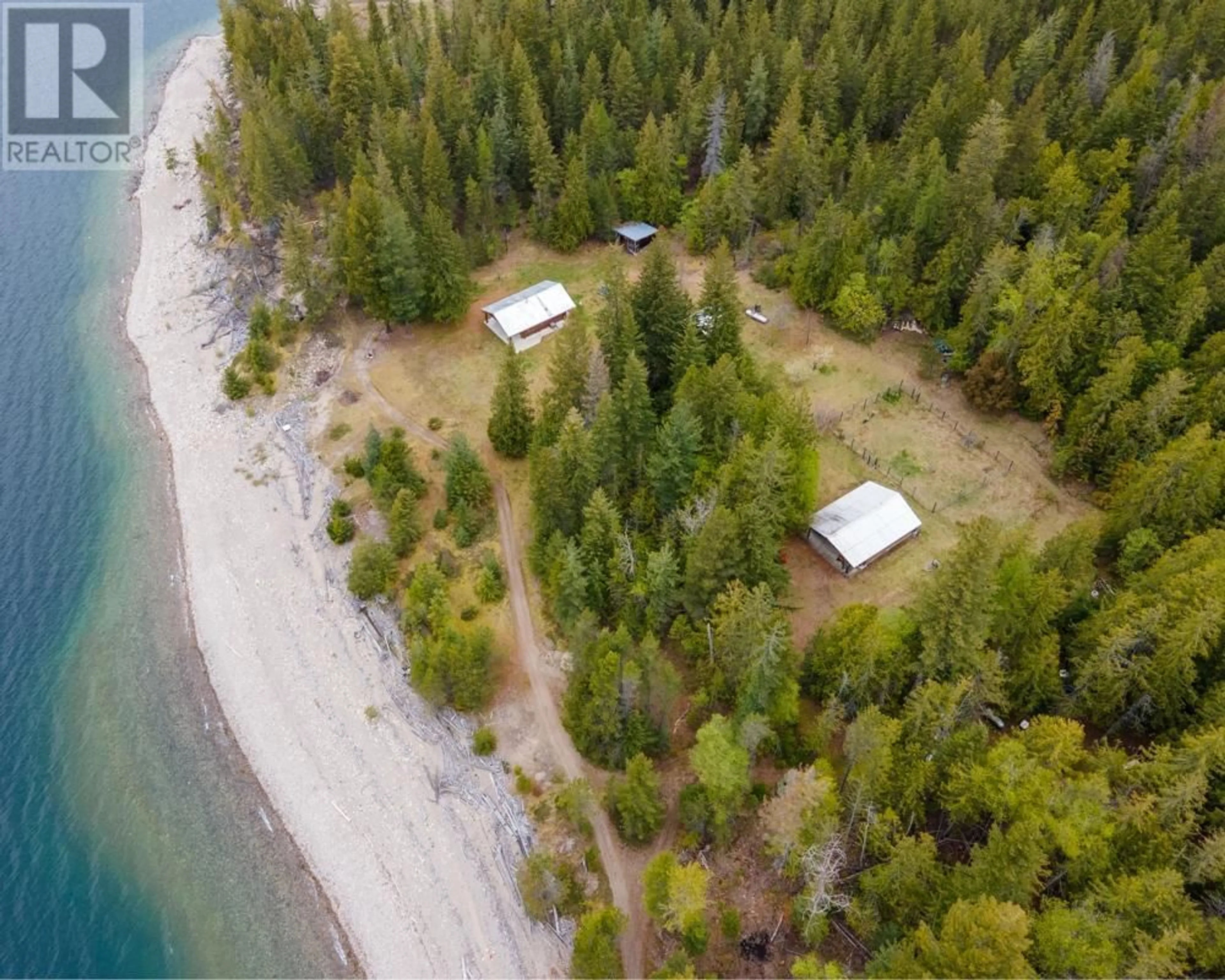 A pic from outside/outdoor area/front of a property/back of a property/a pic from drone, water/lake/river/ocean view for 7717 NORTH KOOTENAY LAKE, Kaslo British Columbia V0G1M0