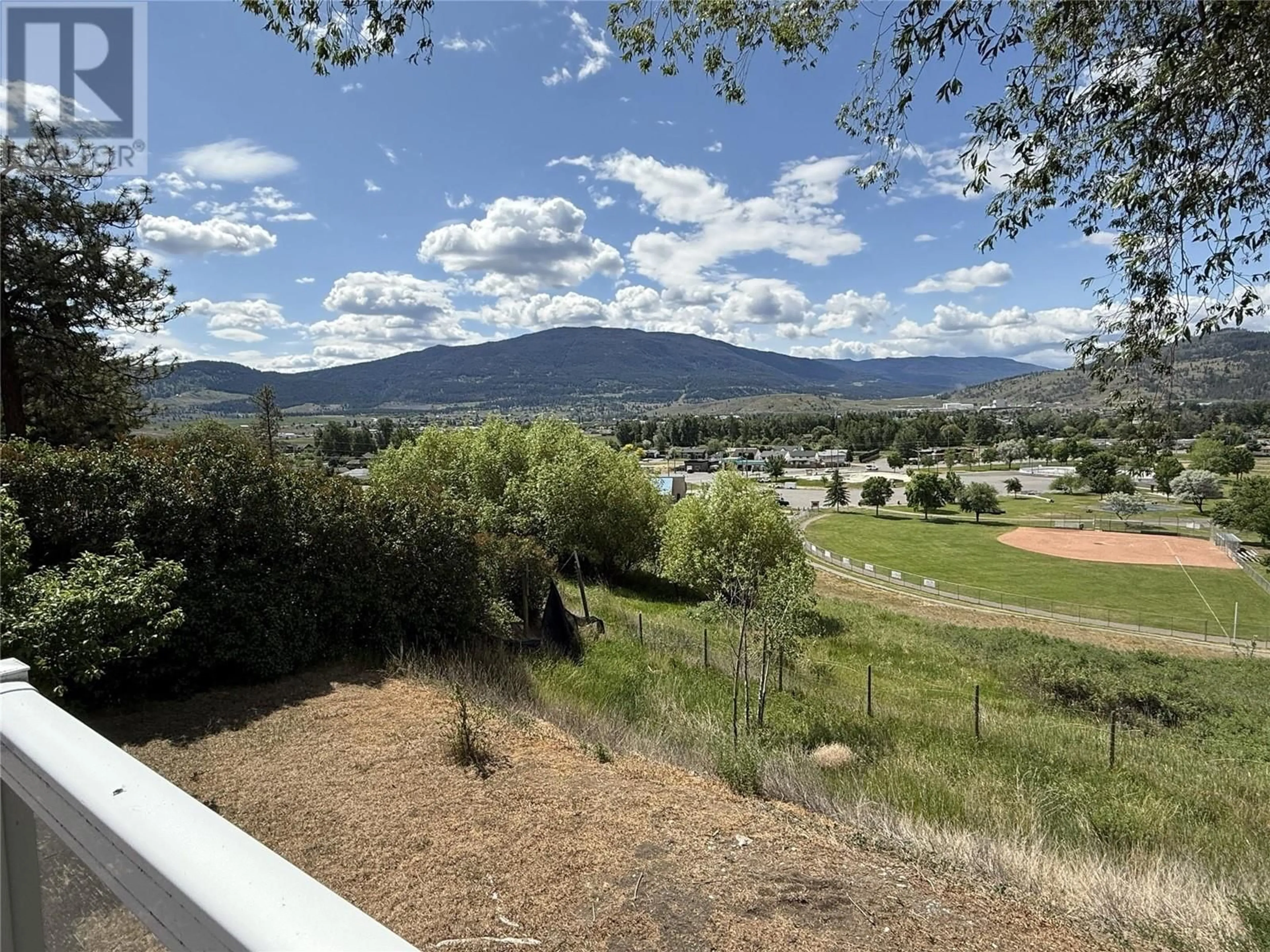 A pic from outside/outdoor area/front of a property/back of a property/a pic from drone, mountain view for 2076 PARKER DRIVE, Merritt British Columbia V1K1J2