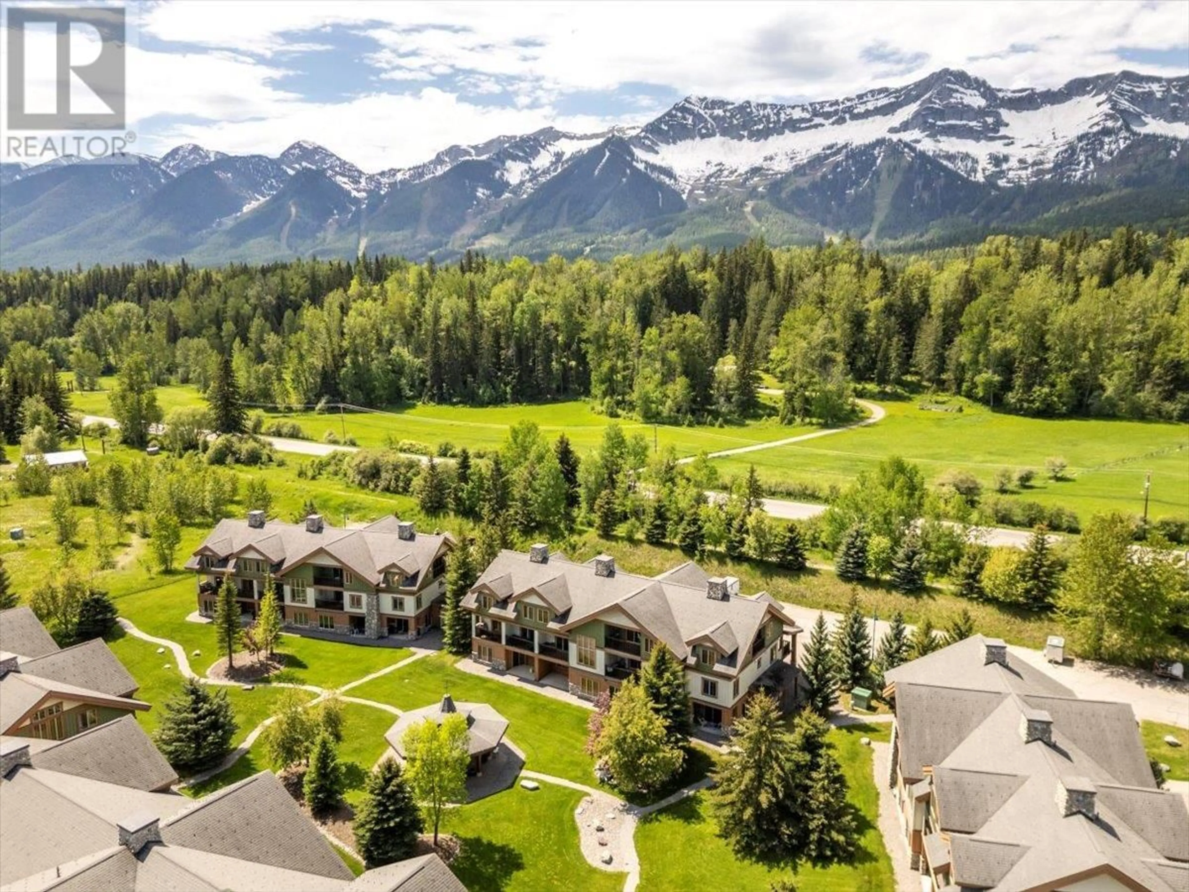A pic from outside/outdoor area/front of a property/back of a property/a pic from drone, mountain view for 203 - 36 RIVERMOUNT PLACE, Fernie British Columbia V0B1M7