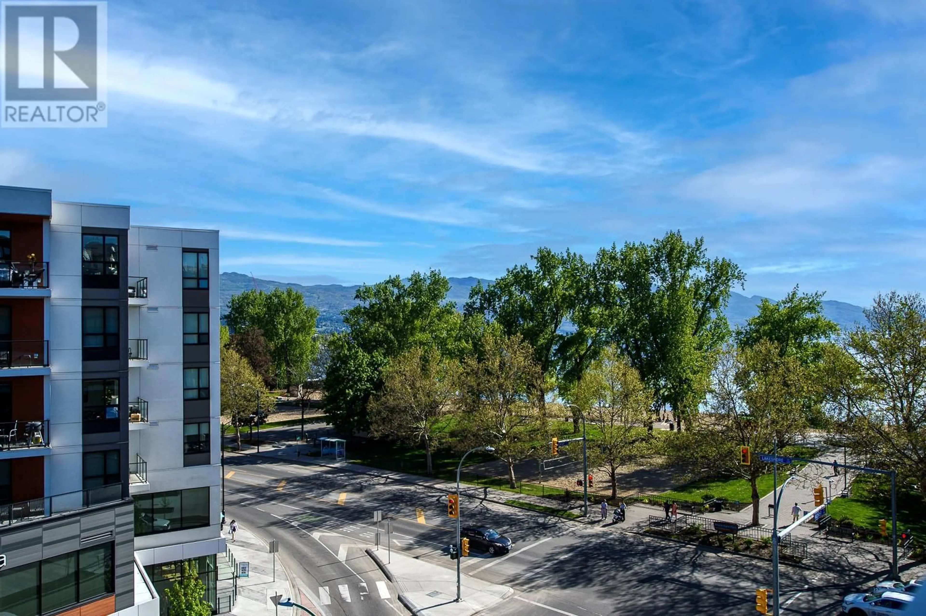 A pic from outside/outdoor area/front of a property/back of a property/a pic from drone, water/lake/river/ocean view for 403 - 3409 LAKESHORE ROAD, Kelowna British Columbia V1W0G6