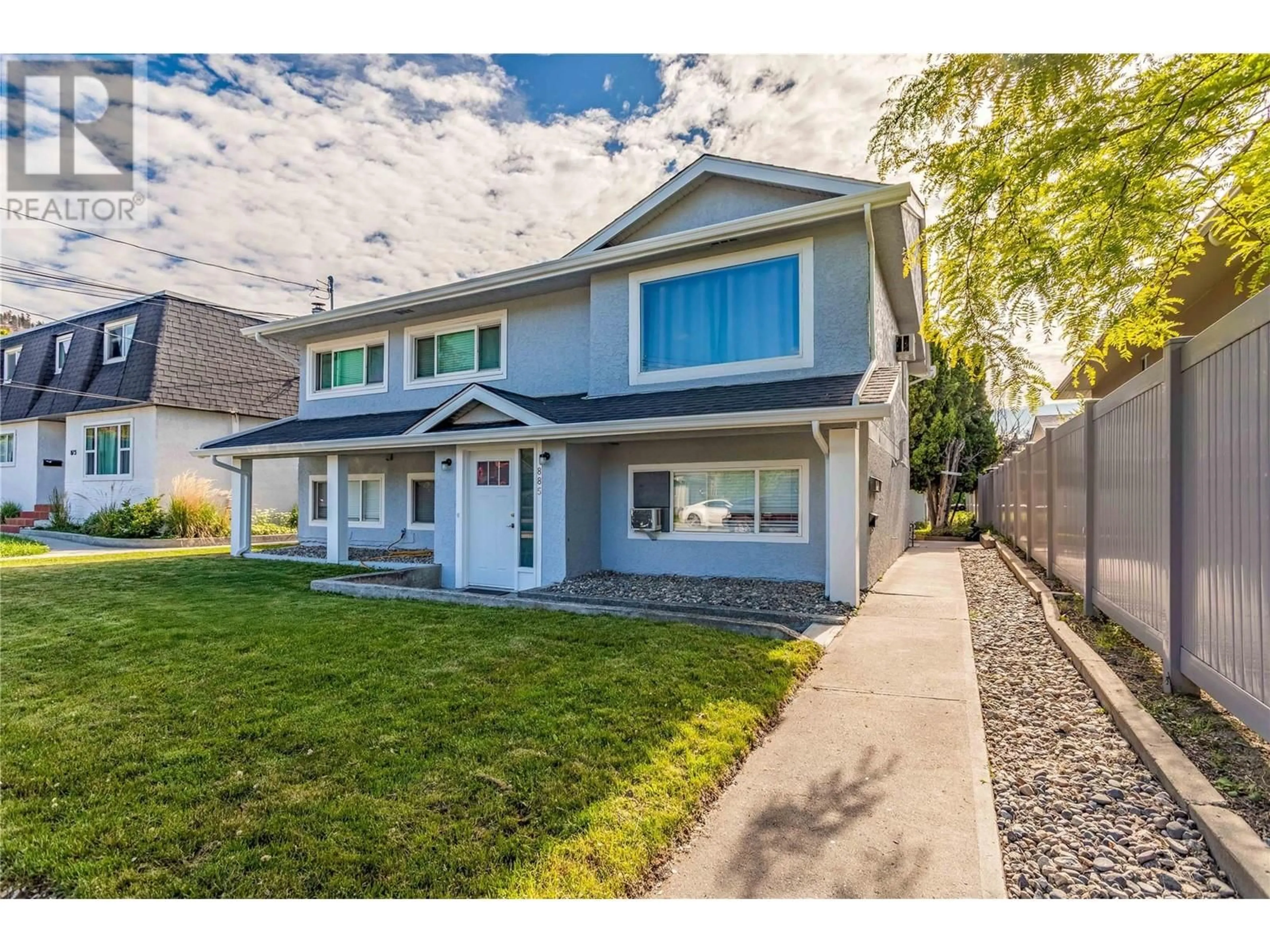 Home with vinyl exterior material, street for 885 WALROD STREET, Kelowna British Columbia V1Y2S4