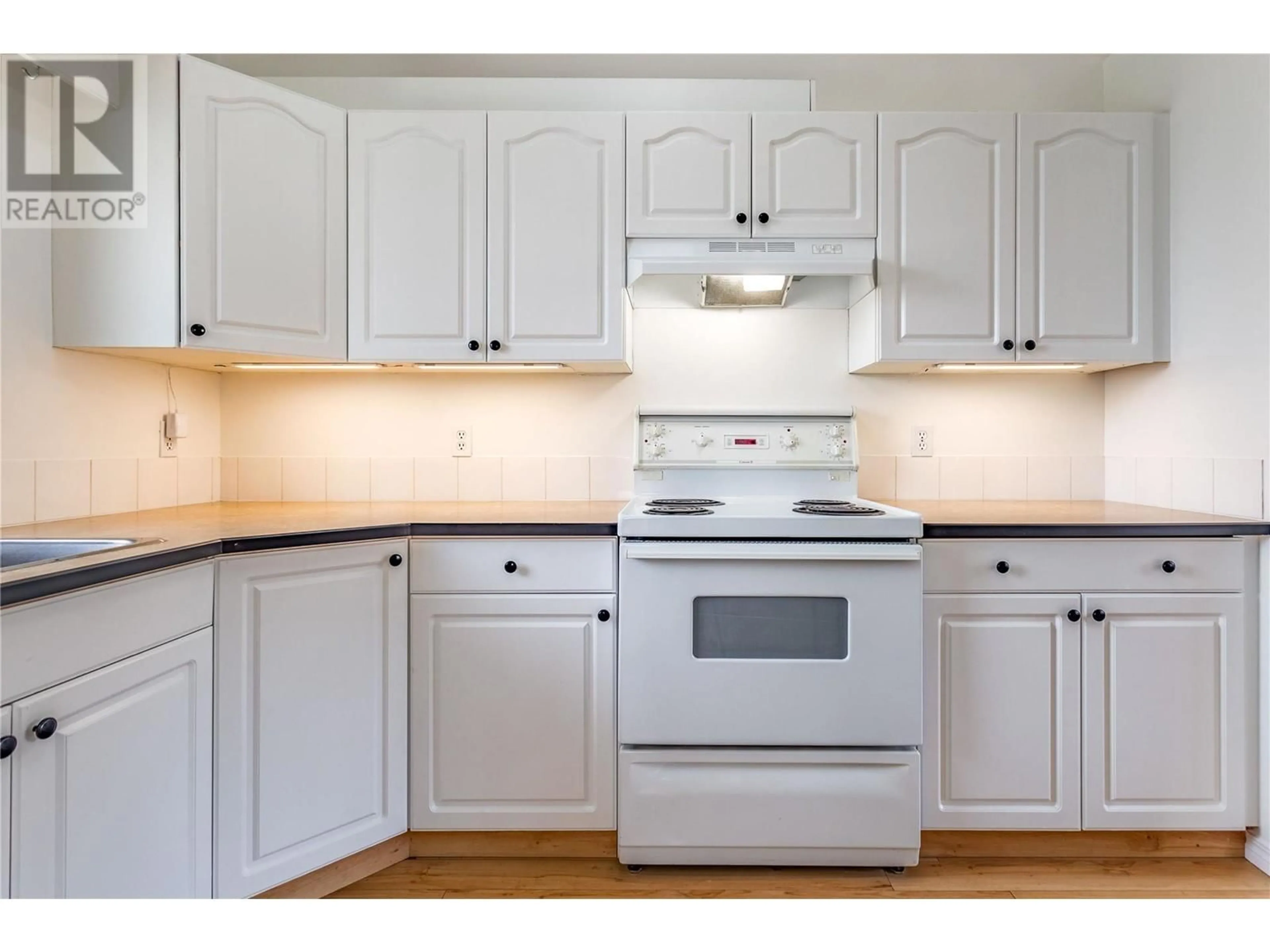 Standard kitchen, wood/laminate floor for 885 WALROD STREET, Kelowna British Columbia V1Y2S4