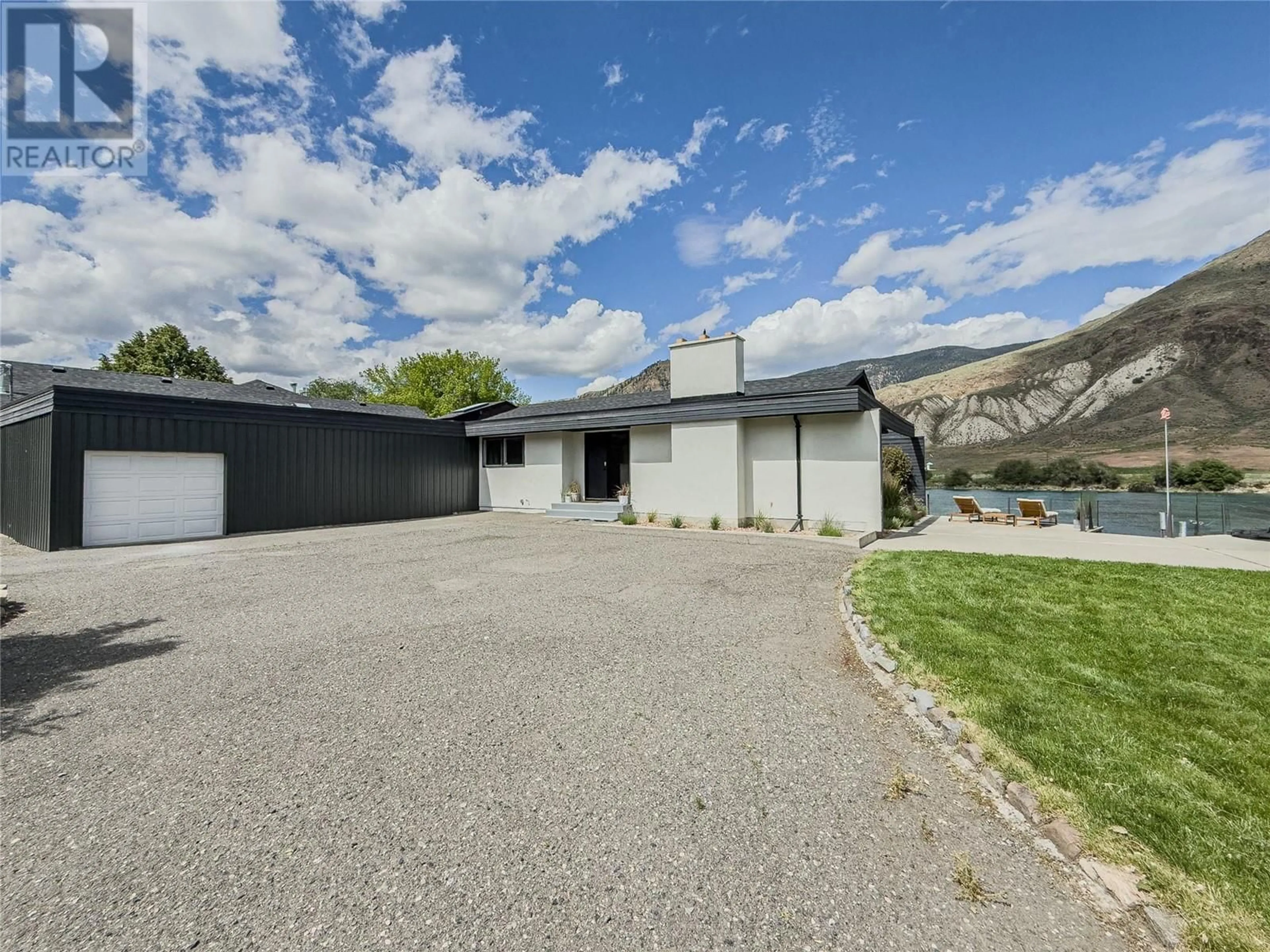 A pic from outside/outdoor area/front of a property/back of a property/a pic from drone, mountain view for 6844 FURRER ROAD, Kamloops British Columbia V2C4V8