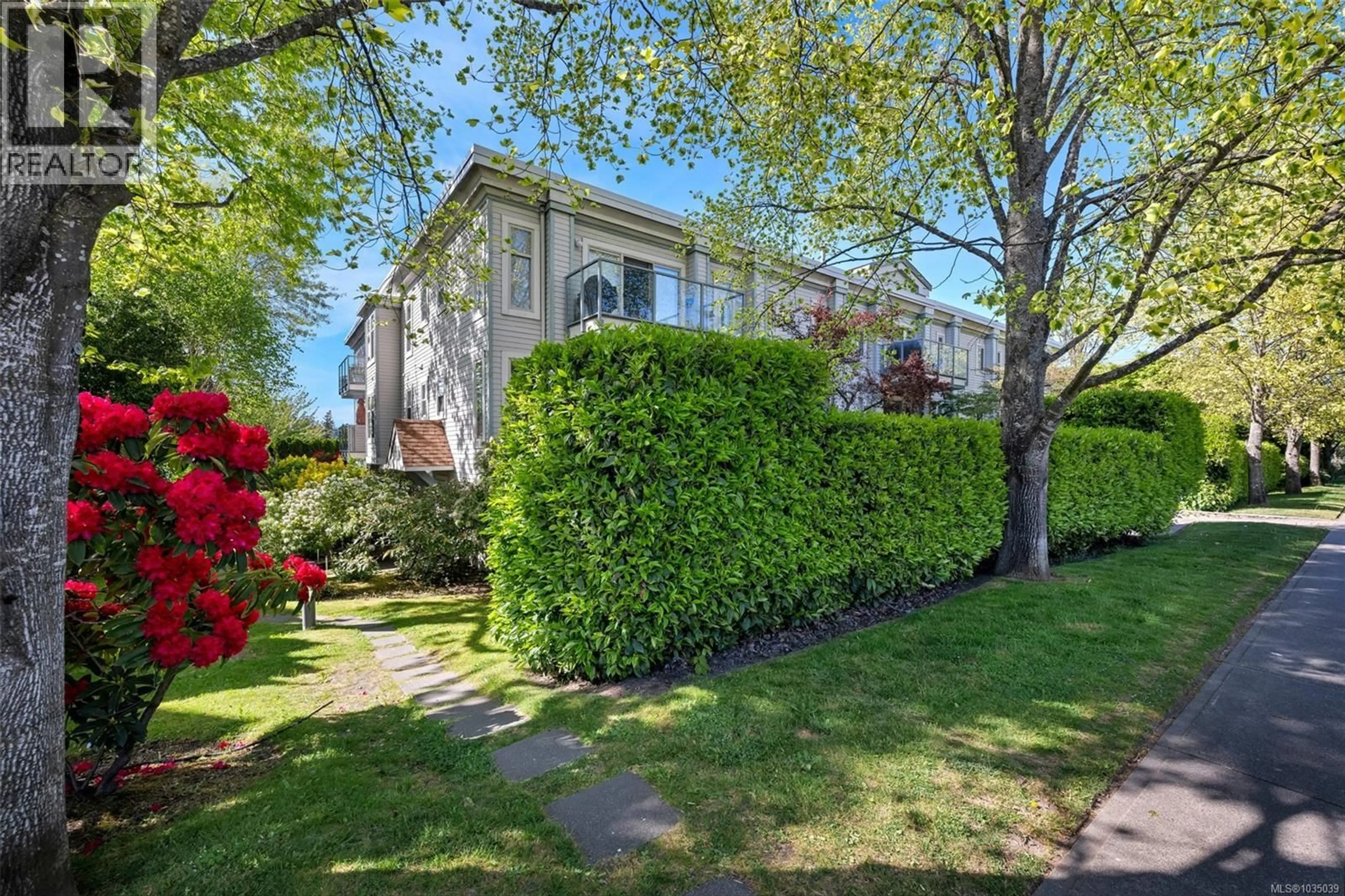 A pic from outside/outdoor area/front of a property/back of a property/a pic from drone, street for 205 - 3160 ALBINA STREET, Saanich British Columbia V9A1Z5