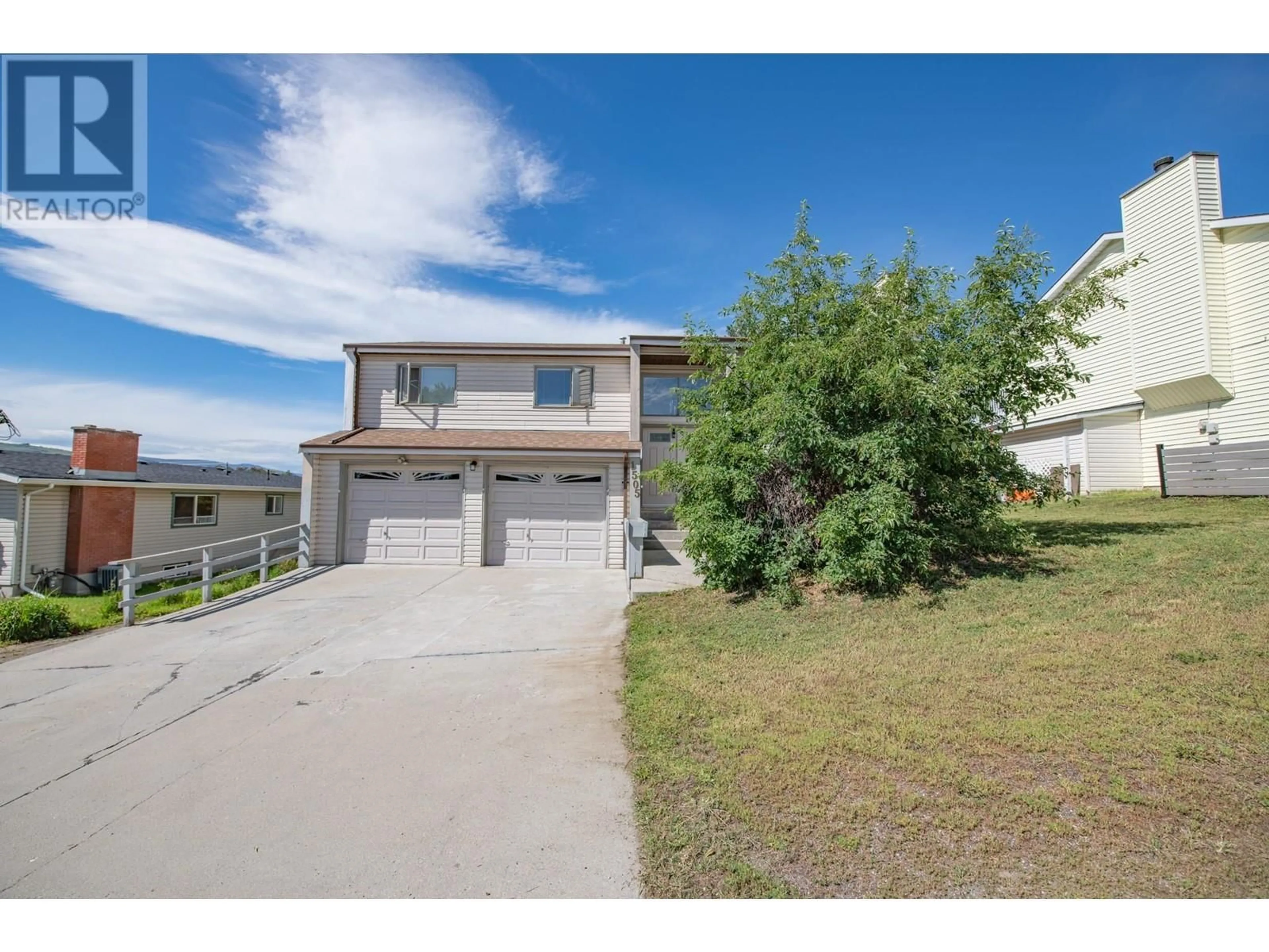 A pic from outside/outdoor area/front of a property/back of a property/a pic from drone, street for 1505 38 AVENUE, Vernon British Columbia V1T2Z1