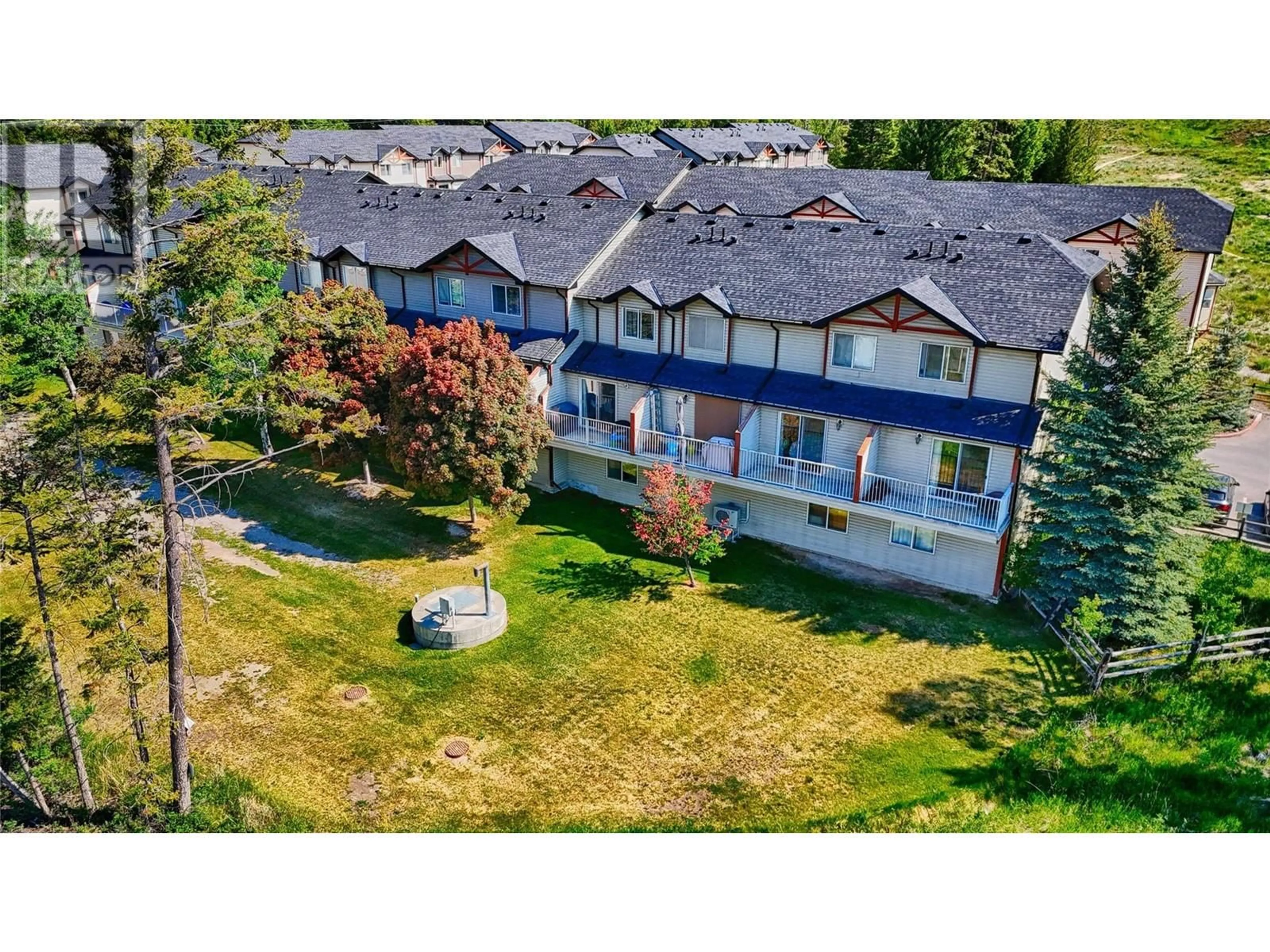 A pic from outside/outdoor area/front of a property/back of a property/a pic from drone, mountain view for 704 - 200 BLACK FOREST TRAIL, Invermere British Columbia V0A1K2