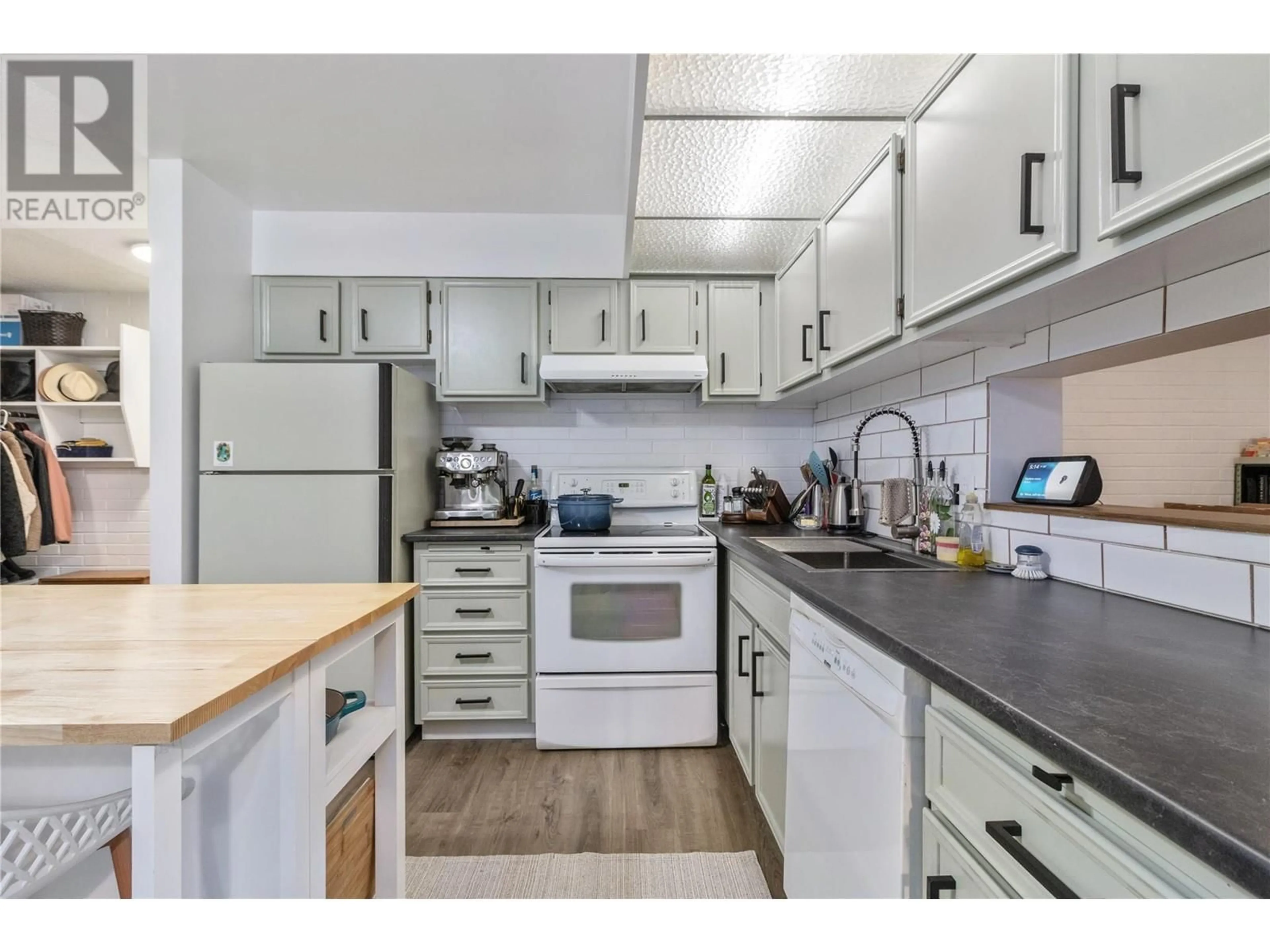 Standard kitchen, wood/laminate floor for 203 - 1915 PACIFIC COURT, Kelowna British Columbia V1Y8B3
