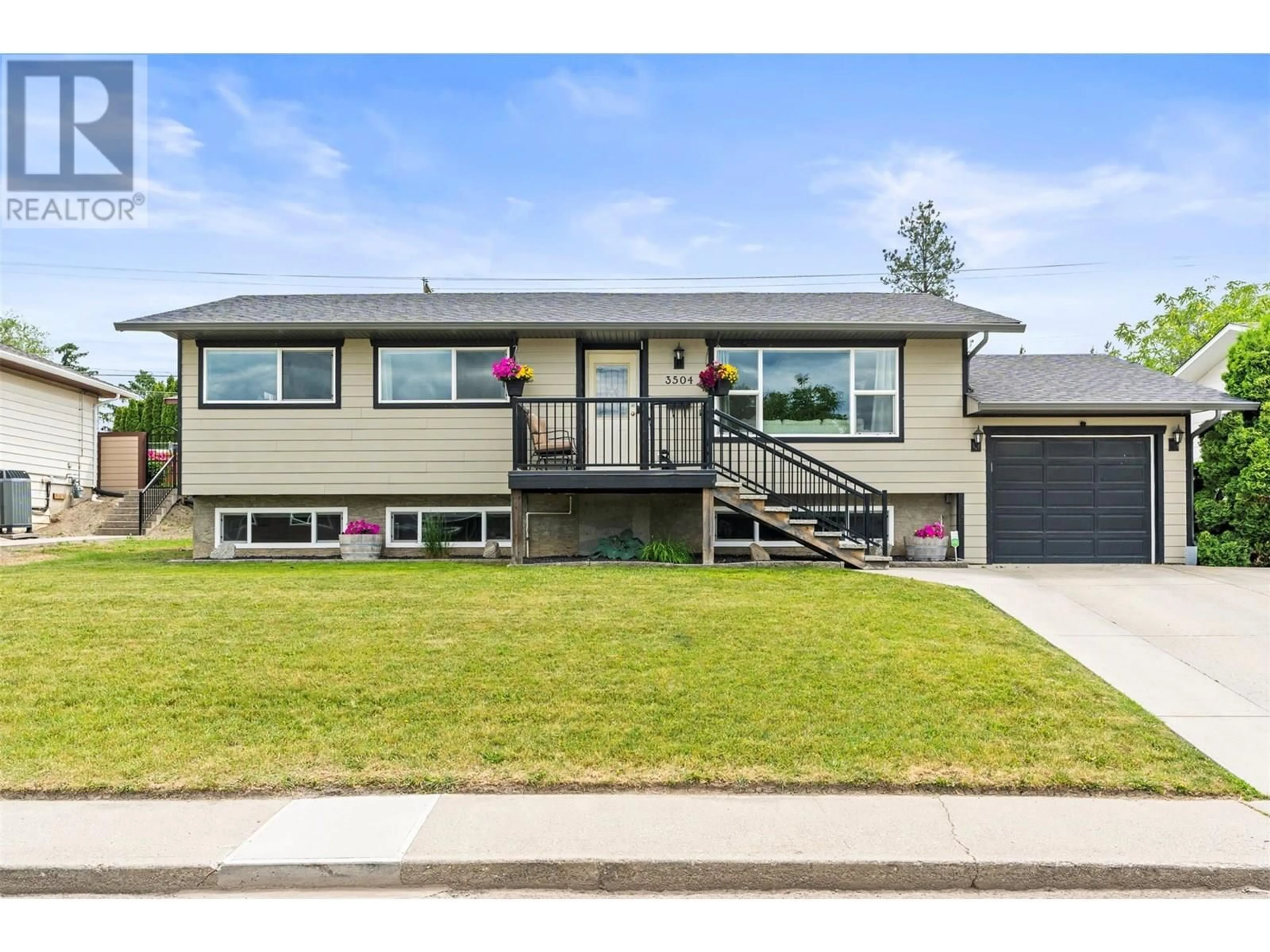 Home with vinyl exterior material, street for 3504 40 AVENUE, Vernon British Columbia V1T6S4