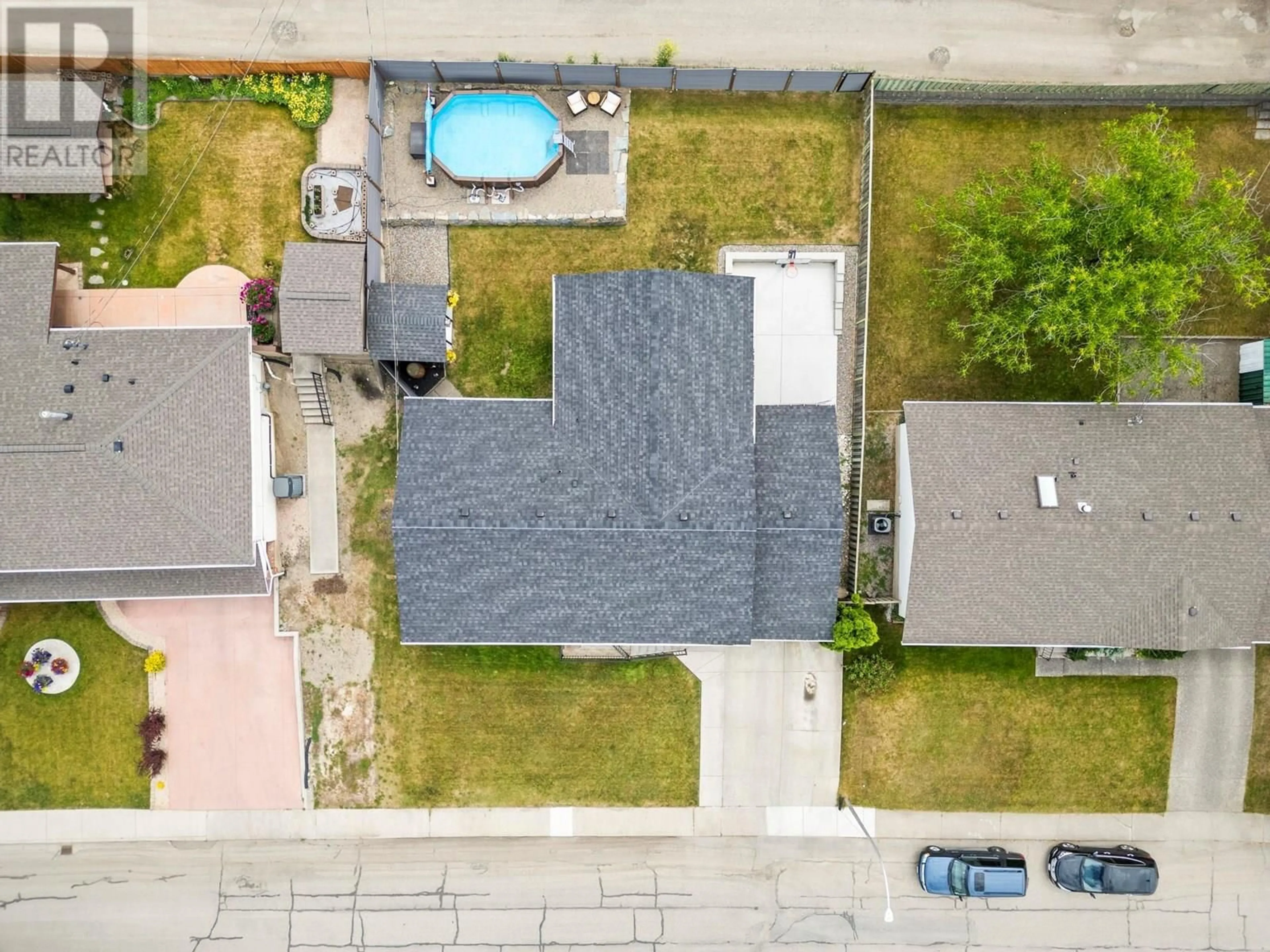 A pic from outside/outdoor area/front of a property/back of a property/a pic from drone, street for 3504 40 AVENUE, Vernon British Columbia V1T6S4