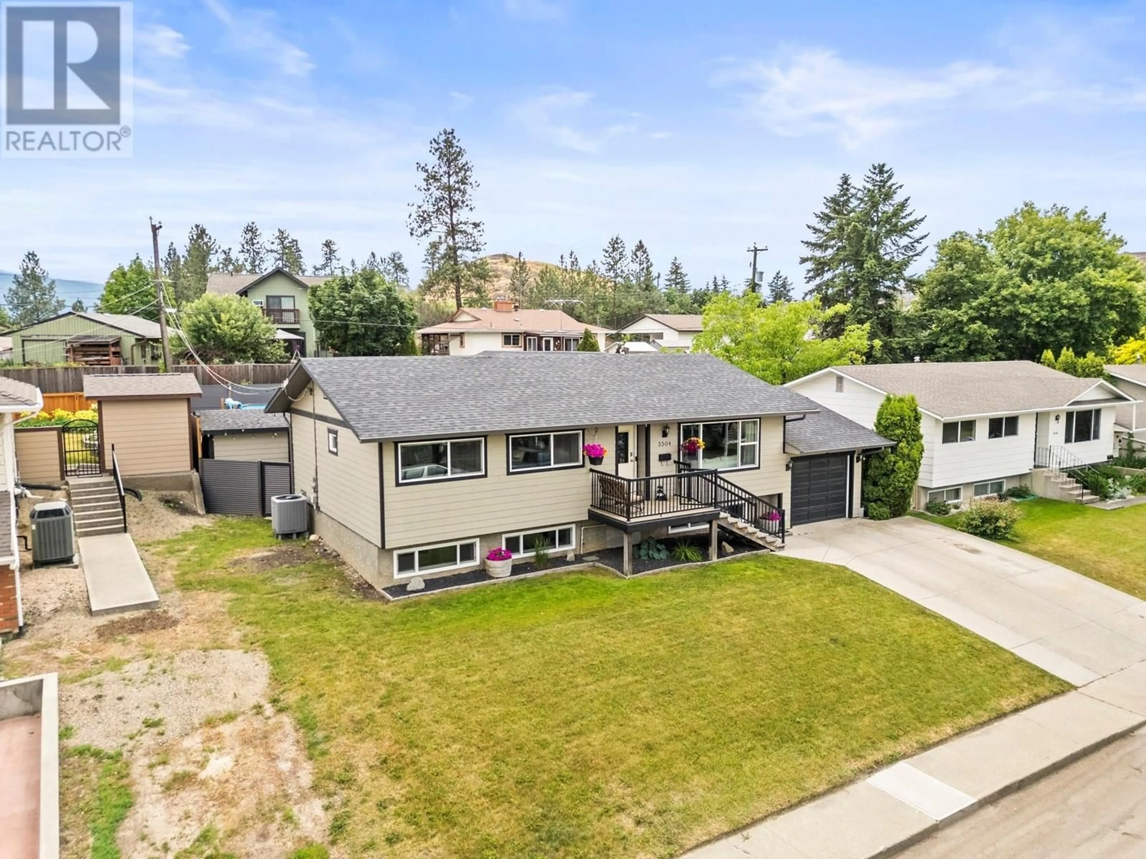 A pic from outside/outdoor area/front of a property/back of a property/a pic from drone, street for 3504 40 AVENUE, Vernon British Columbia V1T6S4