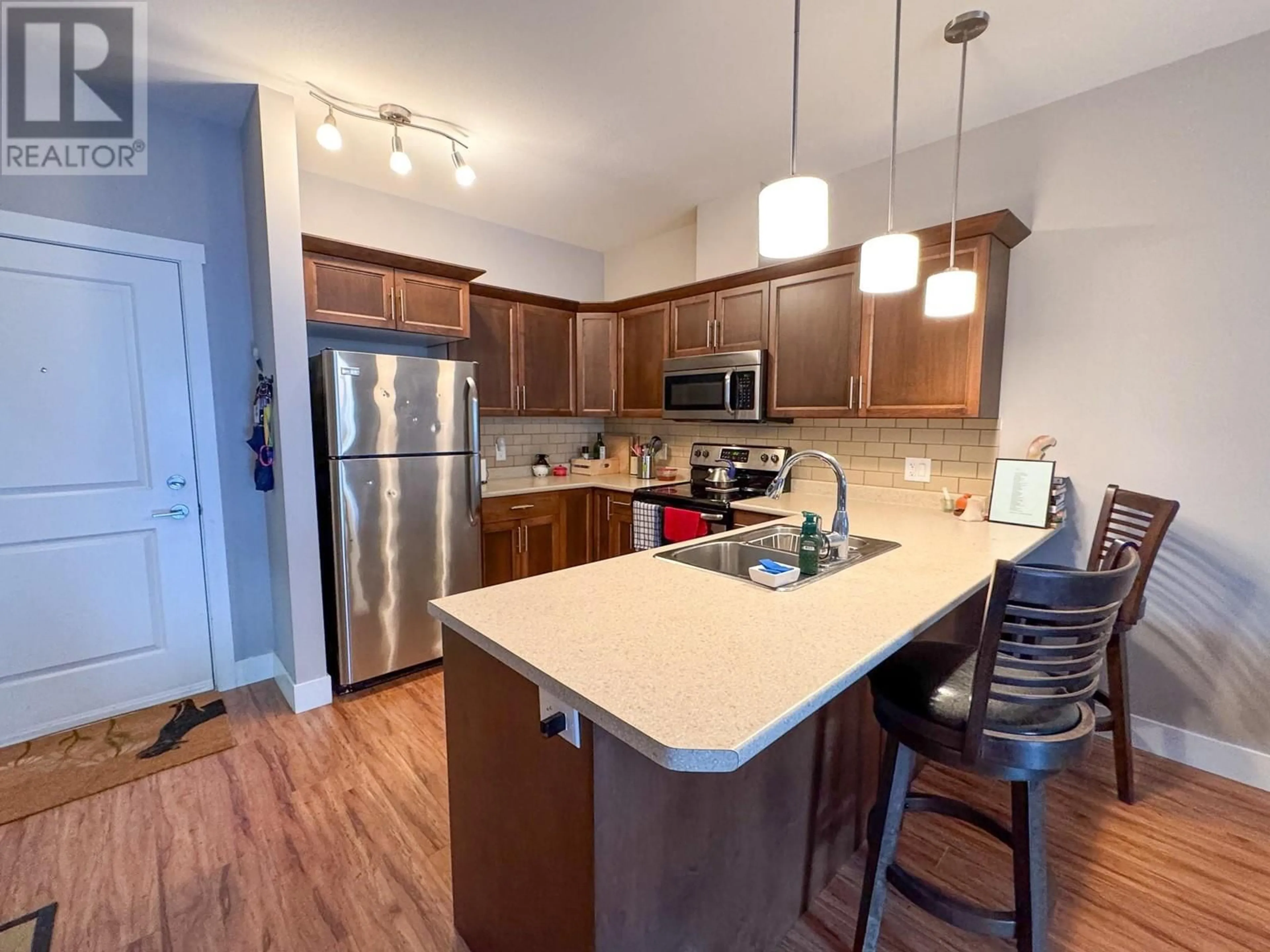 Open concept kitchen, unknown for 305 - 1701 MENZIES STREET, Merritt British Columbia V1K1A5