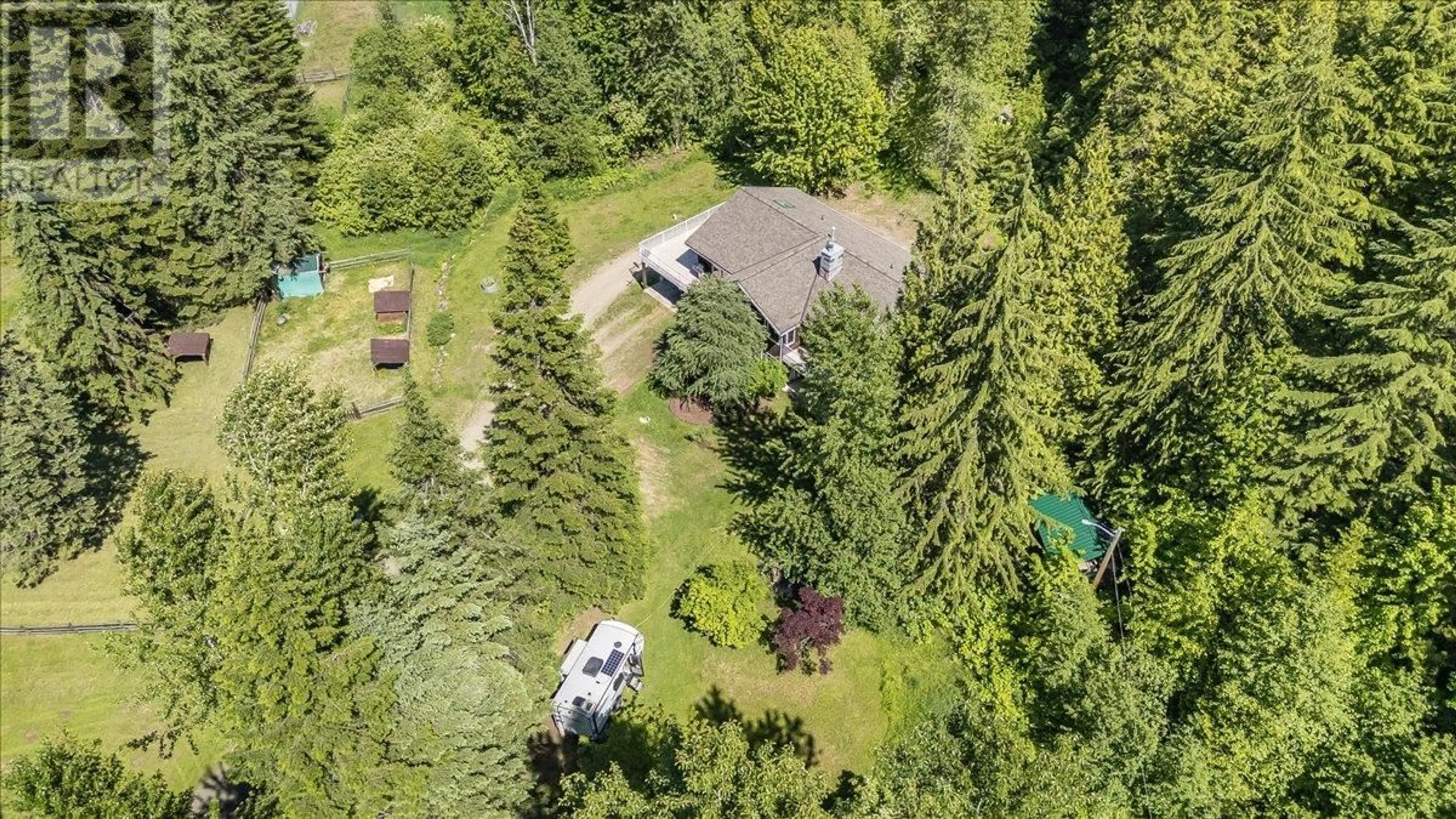 A pic from outside/outdoor area/front of a property/back of a property/a pic from drone, forest/trees view for 4399 BIRD CREEK ROAD, Nelson British Columbia V1L6X2