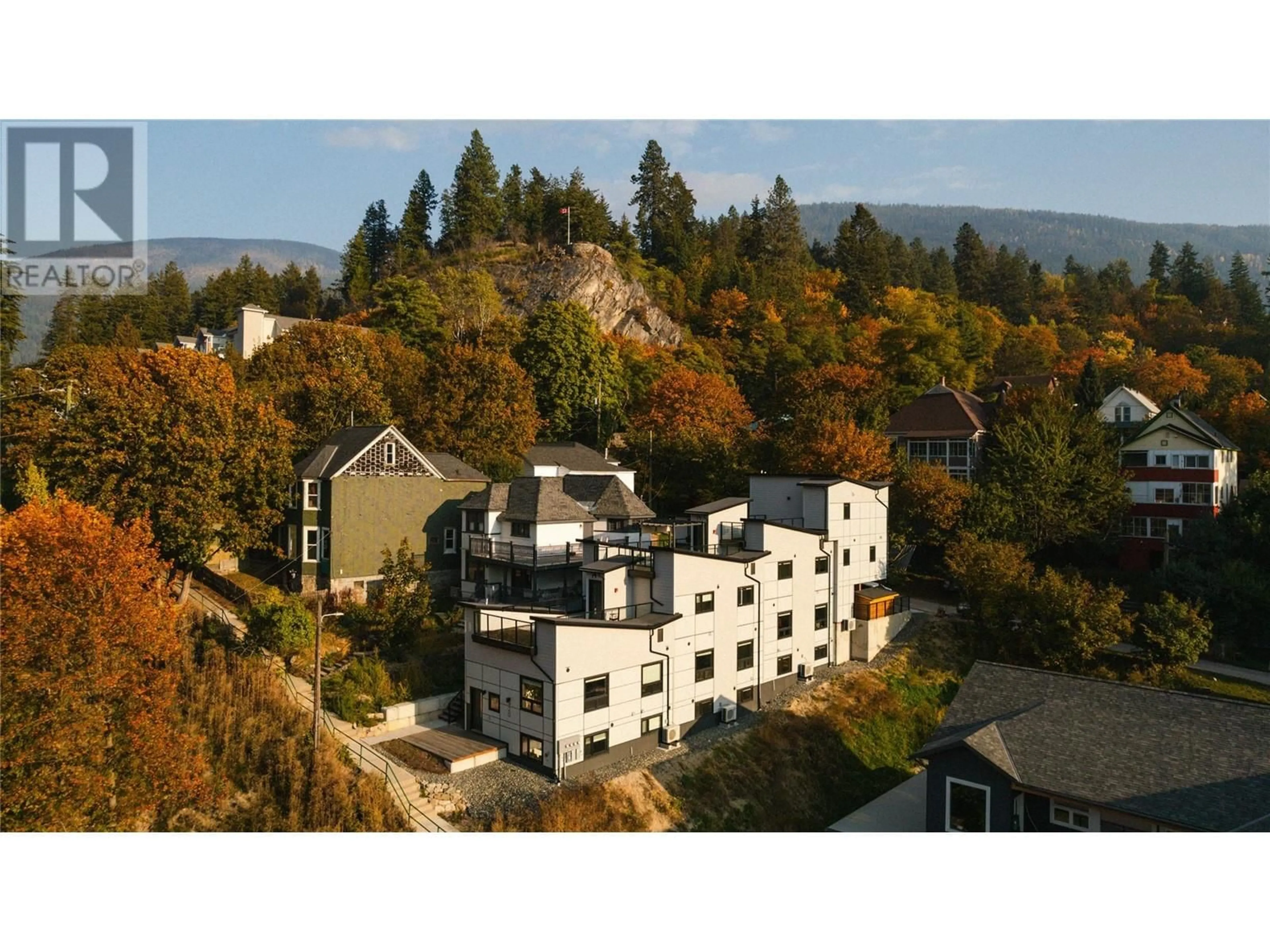 A pic from outside/outdoor area/front of a property/back of a property/a pic from drone, mountain view for B - 920 FRONT STREET, Nelson British Columbia V1L4C2