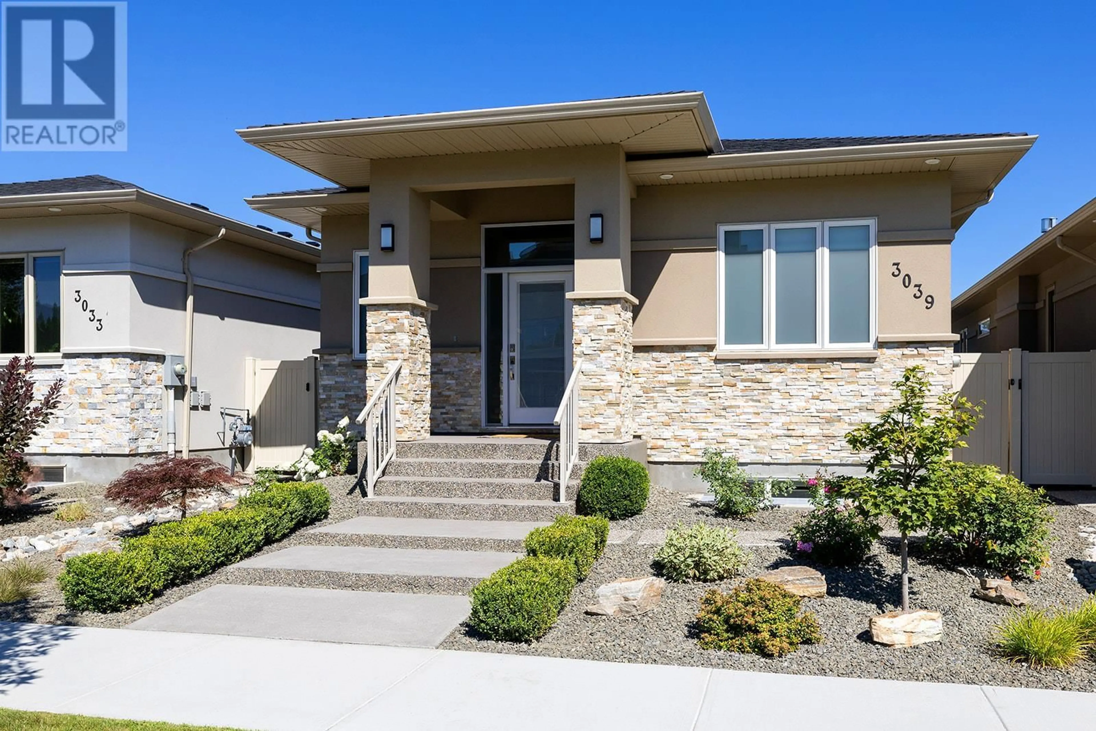 Home with brick exterior material, street for 3039 BURTCH ROAD, Kelowna British Columbia V1W3Z4