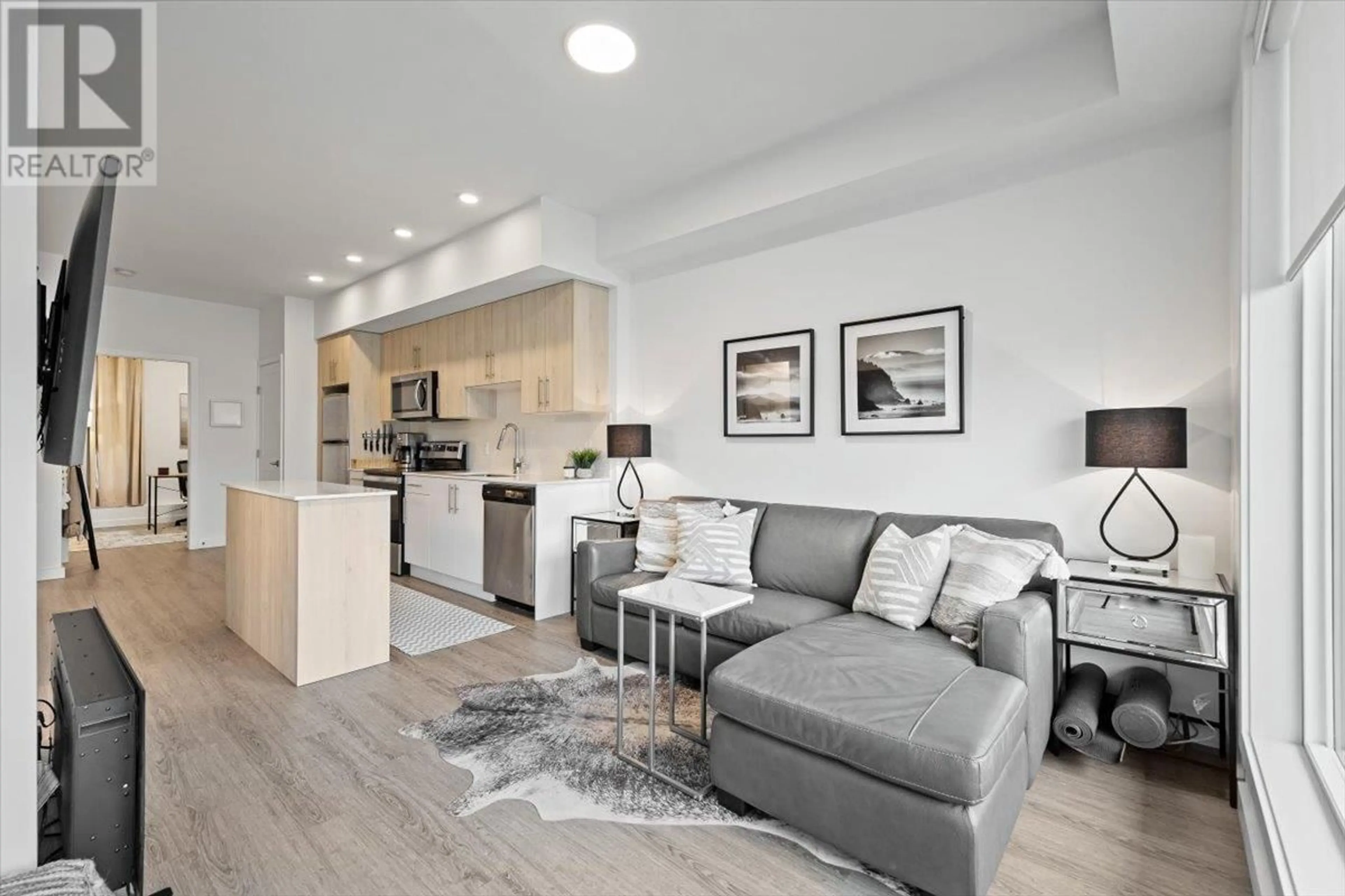 Living room with furniture, unknown for 28 - 685 BOYNTON PLACE, Kelowna British Columbia V1V2Z4