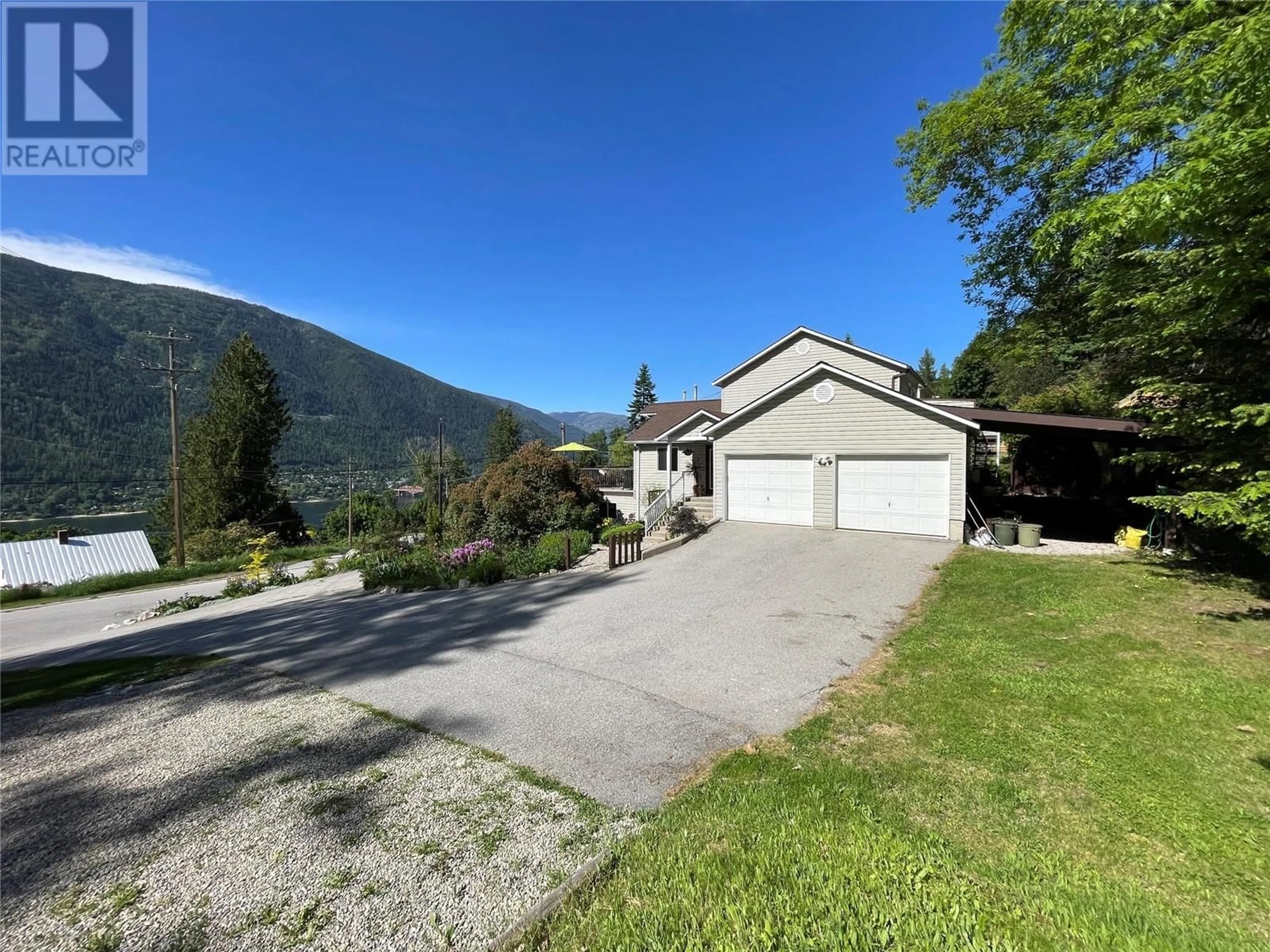 A pic from outside/outdoor area/front of a property/back of a property/a pic from drone, mountain view for 1208 SELBY STREET, Nelson British Columbia V1L2W3
