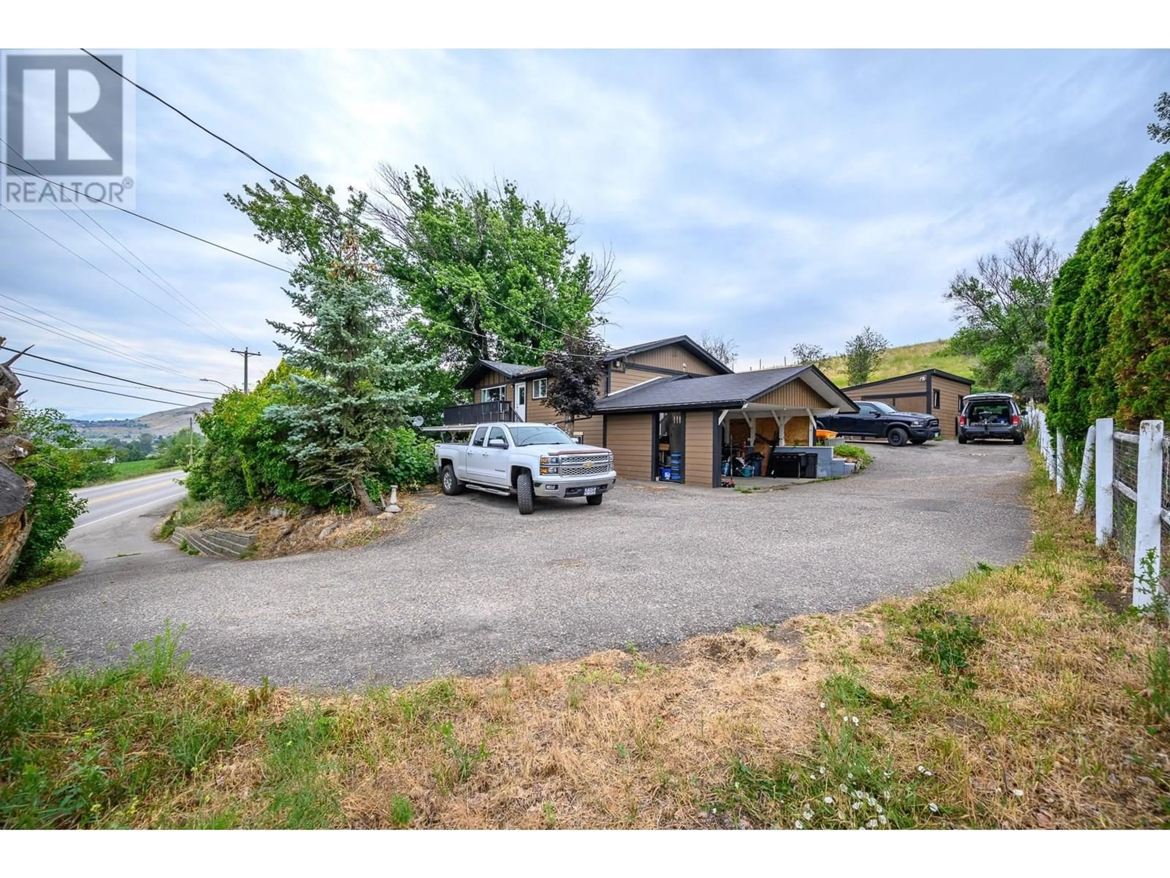 A pic from outside/outdoor area/front of a property/back of a property/a pic from drone, unknown for 9221 6 HIGHWAY, Coldstream British Columbia V1B3B5
