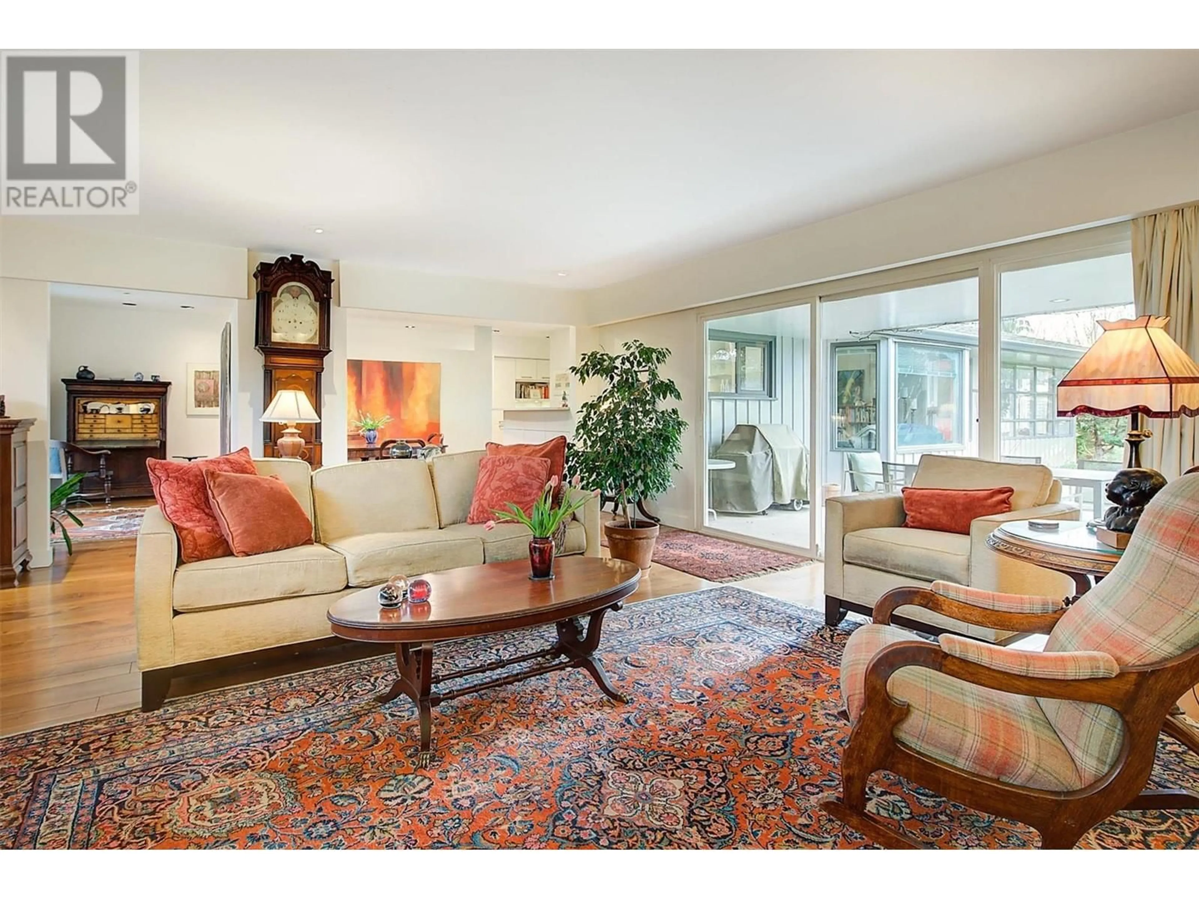 Living room with furniture, carpet floor for 2021 ABBOTT STREET, Kelowna British Columbia V1Y1C4