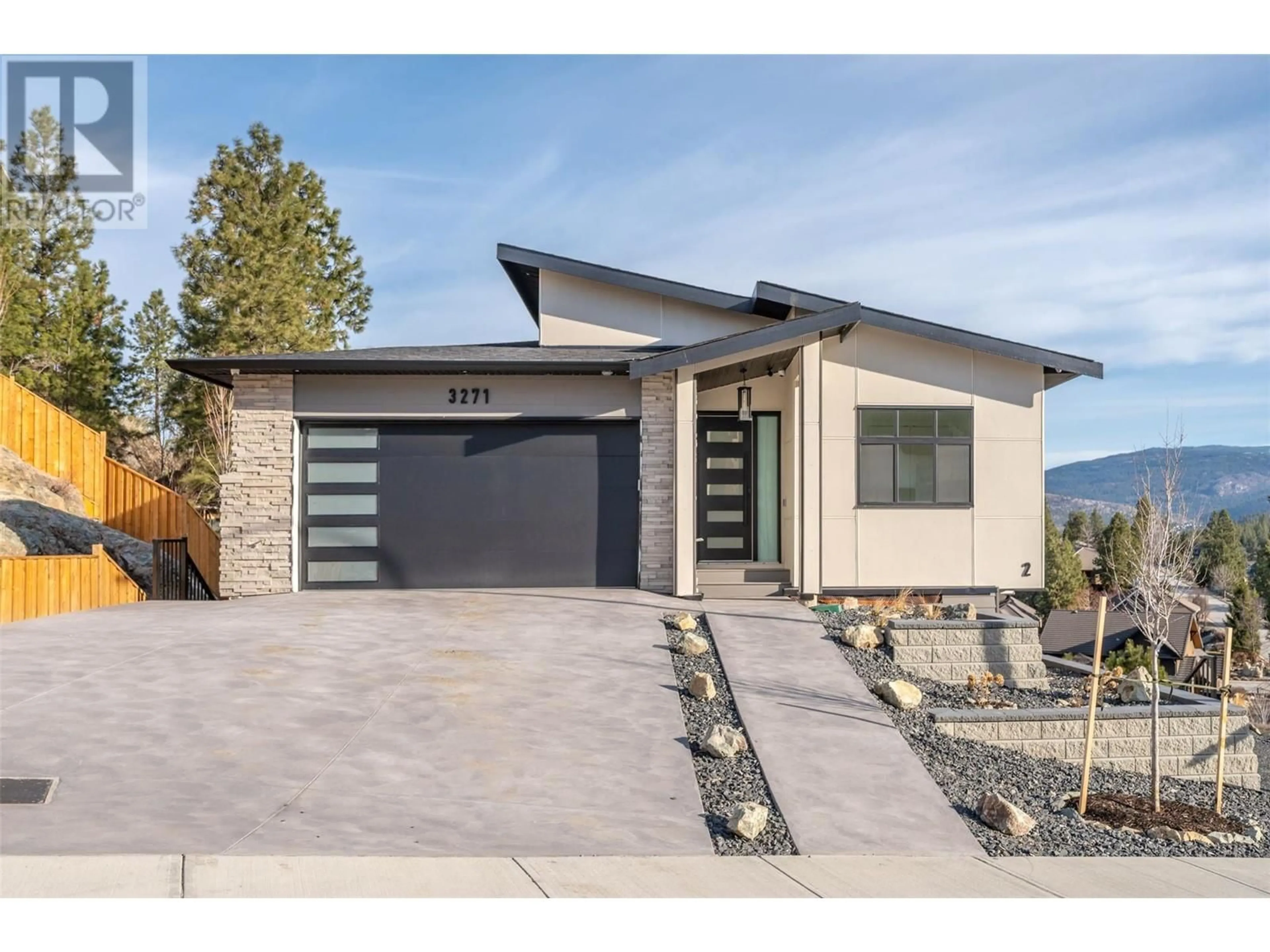 Home with brick exterior material, street for 3271 EVERGREEN DRIVE, Penticton British Columbia V2A9A9