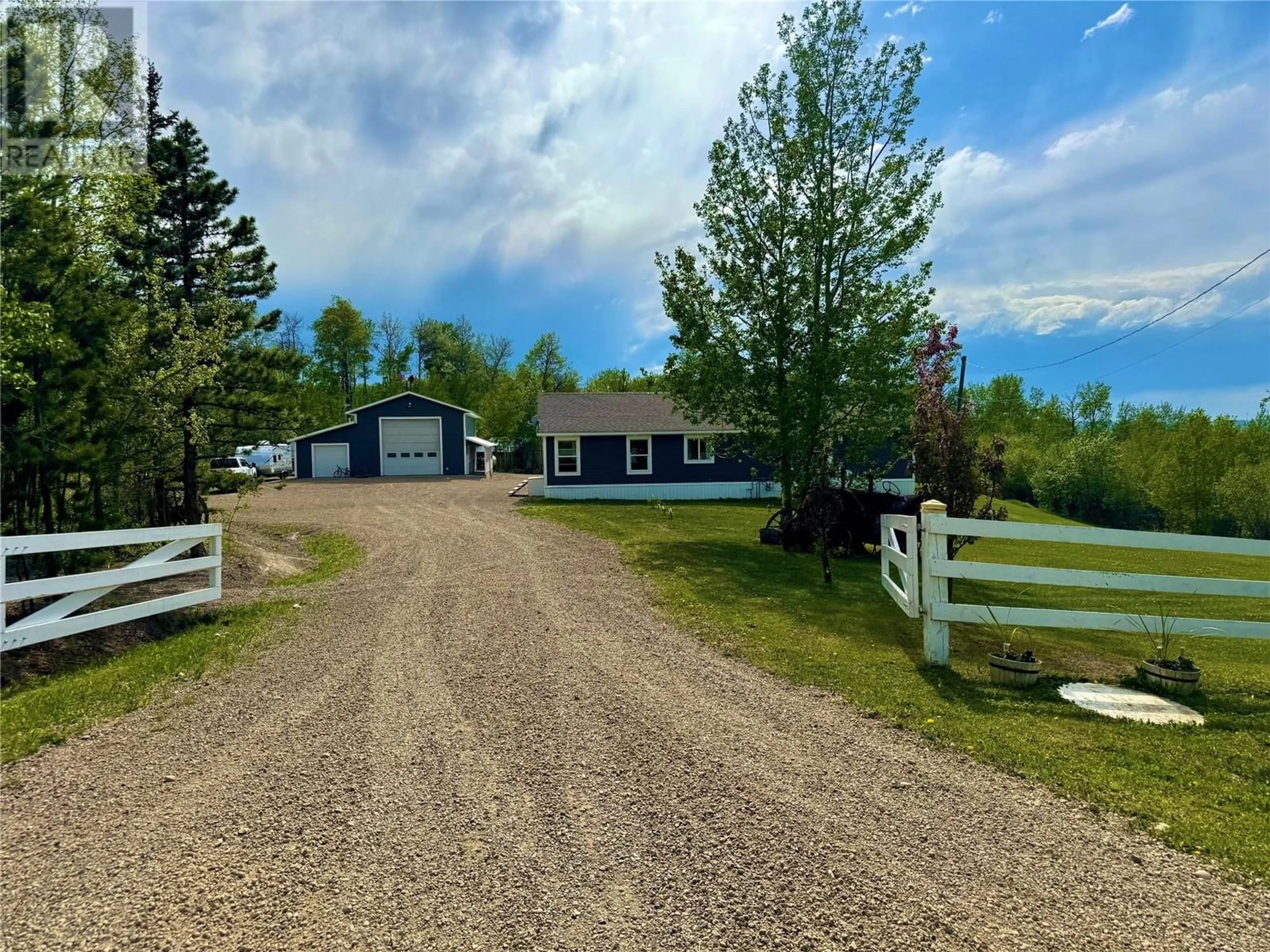 A pic from outside/outdoor area/front of a property/back of a property/a pic from drone, street for 13167 MCKINNON WAY, Dawson Creek British Columbia V1G5A1