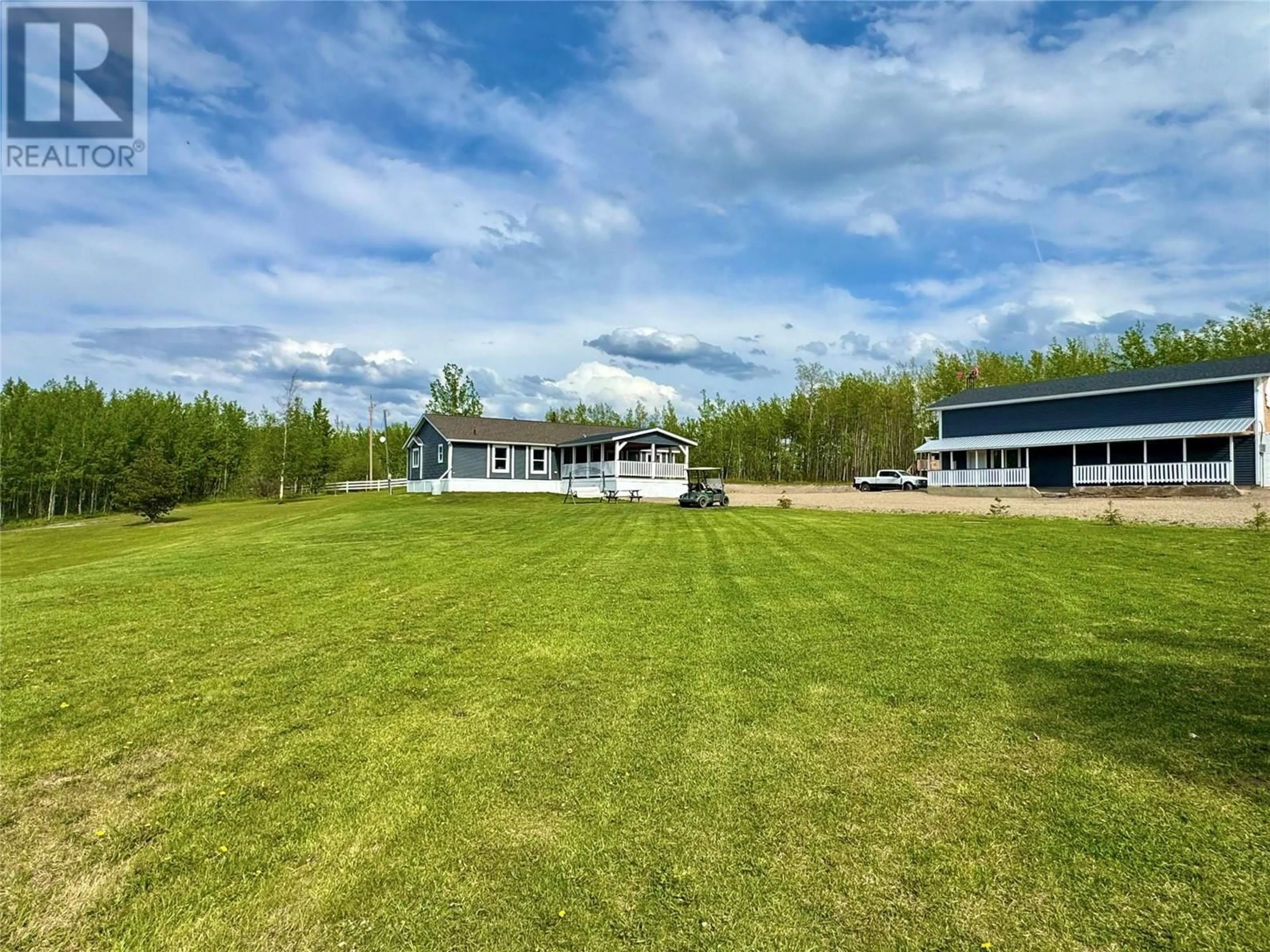 A pic from outside/outdoor area/front of a property/back of a property/a pic from drone, water/lake/river/ocean view for 13167 MCKINNON WAY, Dawson Creek British Columbia V1G5A1