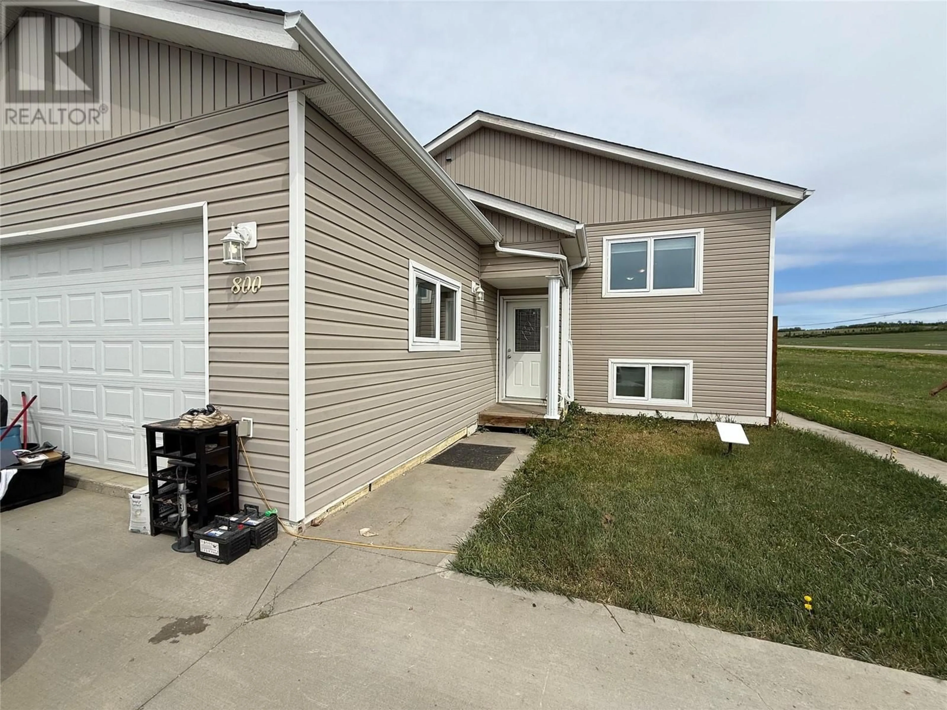 Home with vinyl exterior material, unknown for 800 88 AVENUE, Dawson Creek British Columbia V1G0C9