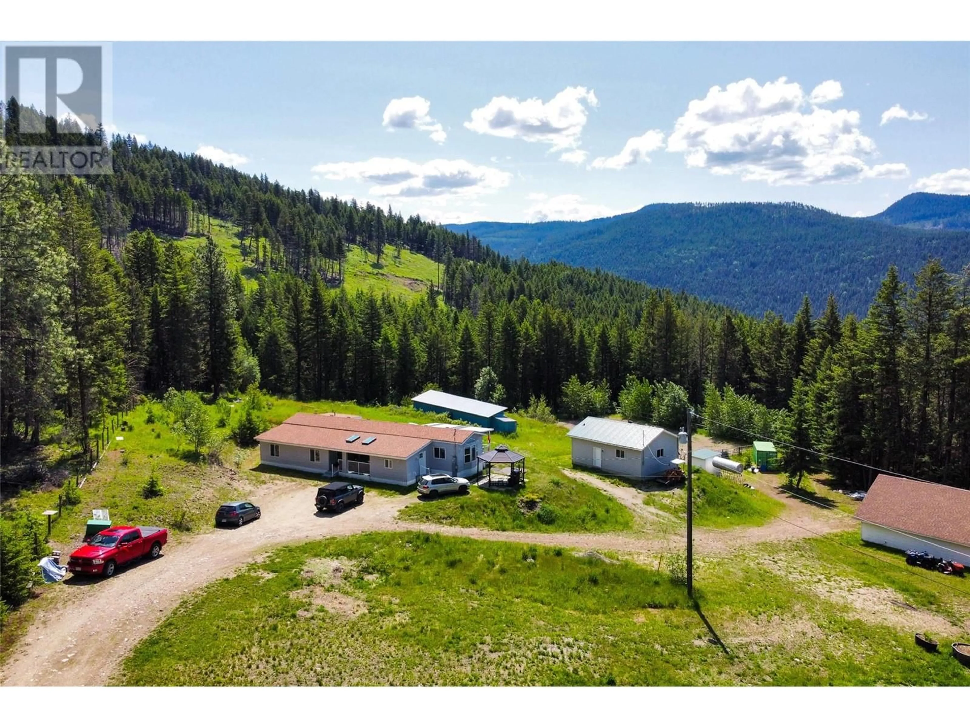 A pic from outside/outdoor area/front of a property/back of a property/a pic from drone, mountain view for 1881 CARDINAL CREEK ROAD, Kelowna British Columbia V1P1J3