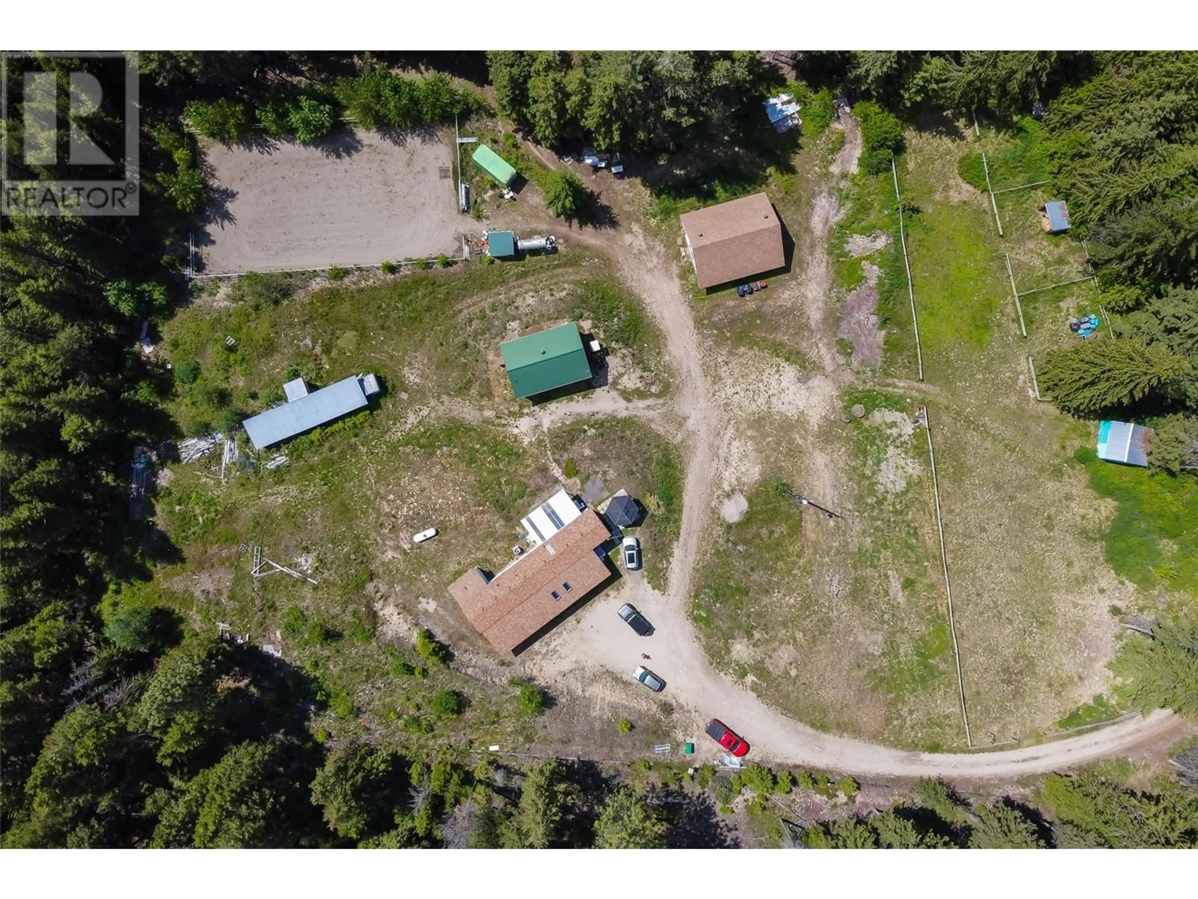 A pic from outside/outdoor area/front of a property/back of a property/a pic from drone, street for 1881 CARDINAL CREEK ROAD, Kelowna British Columbia V1P1J3