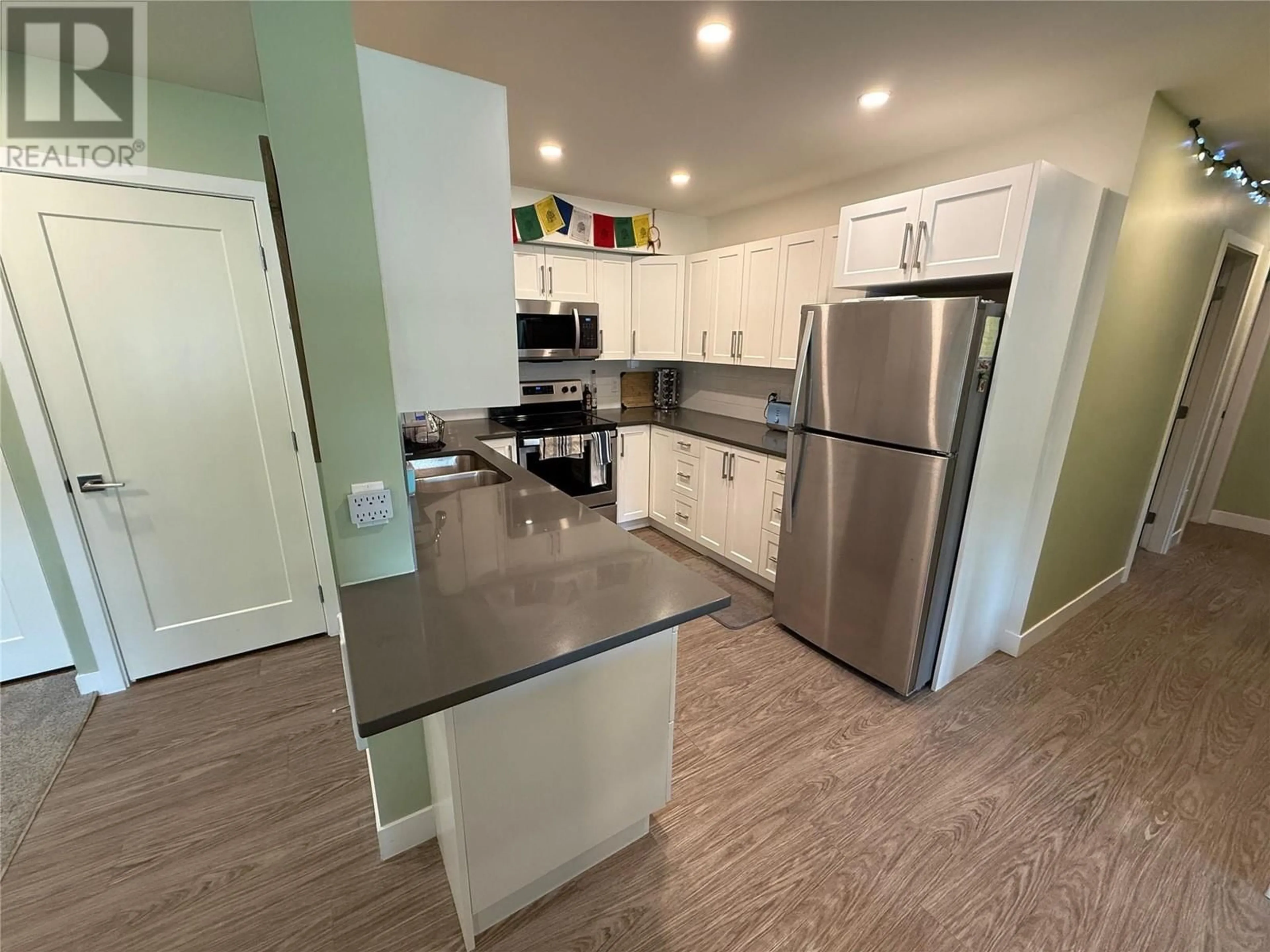 Open concept kitchen, unknown for 2100 - 1901 NELS NELSON CRESCENT, Revelstoke British Columbia V0E2S3