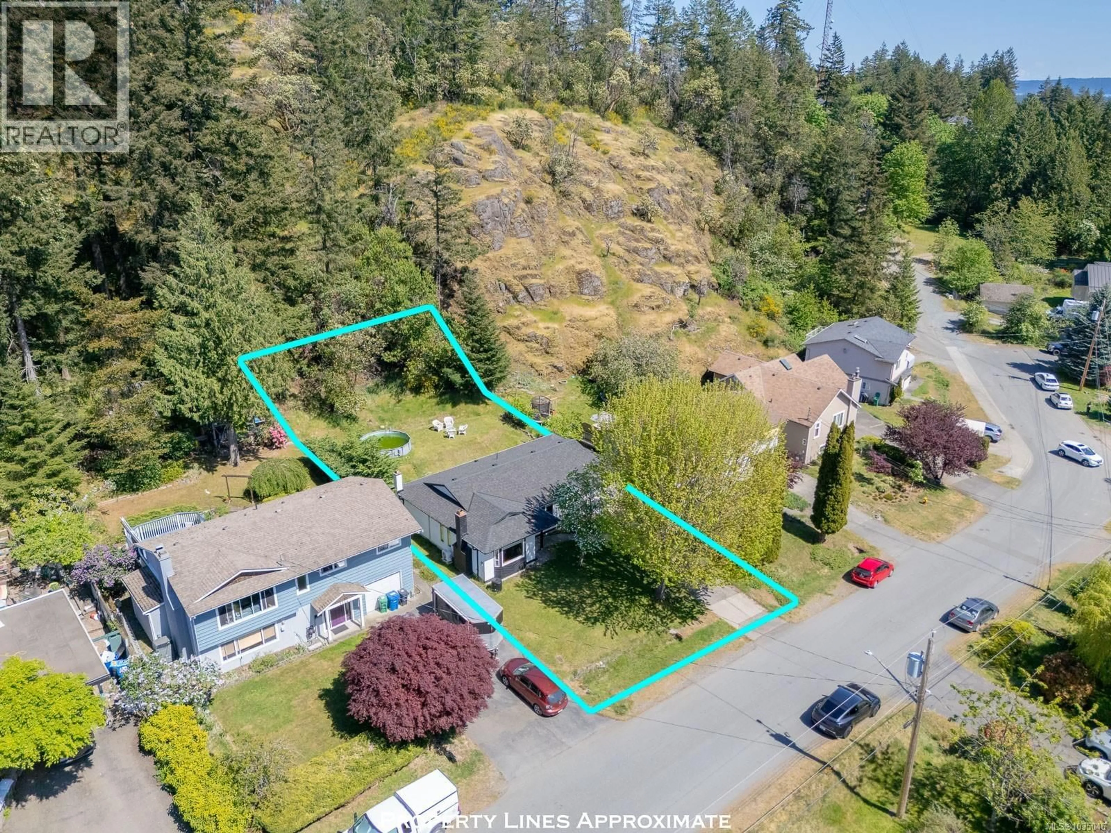 A pic from outside/outdoor area/front of a property/back of a property/a pic from drone, street for 3716 HOWDEN DRIVE, Nanaimo British Columbia V9T3V9